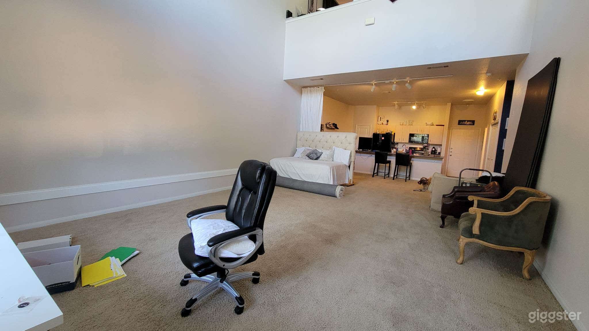 Shooting area view from window. There is a white curtain to divide the area from the kitchen