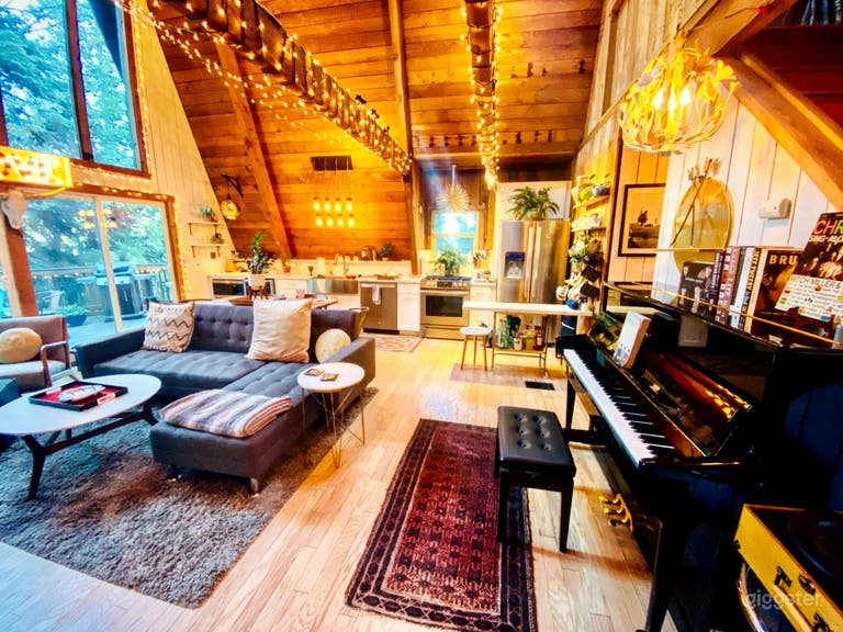  Open Concept Kitchen and Living Room featuring a finely tuned Studio Ritmuller Piano. 