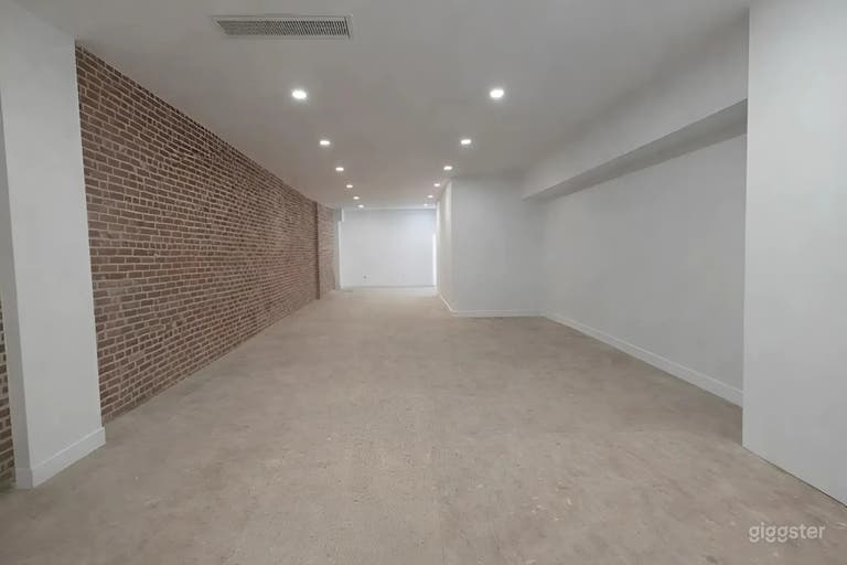  2,600 sq ft Two-Level Downtown Venue — Full Glass Storefront 