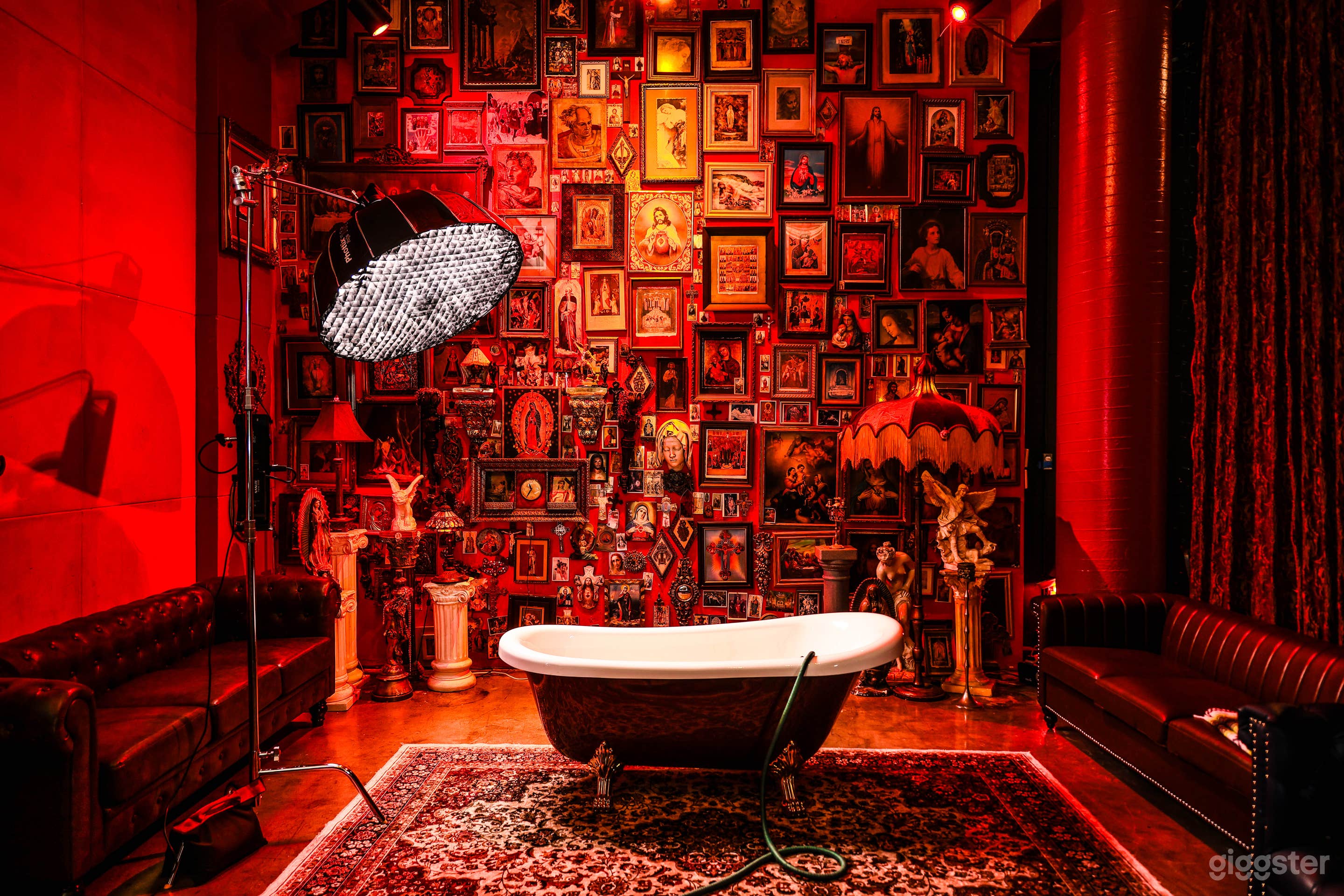 Bathtub in front of the Jesus Wall.