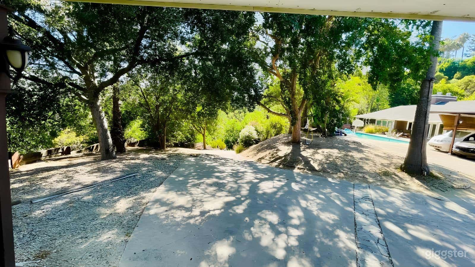 In-Ground Pool with Lounge Chairs and Shaded Areas Photo 4