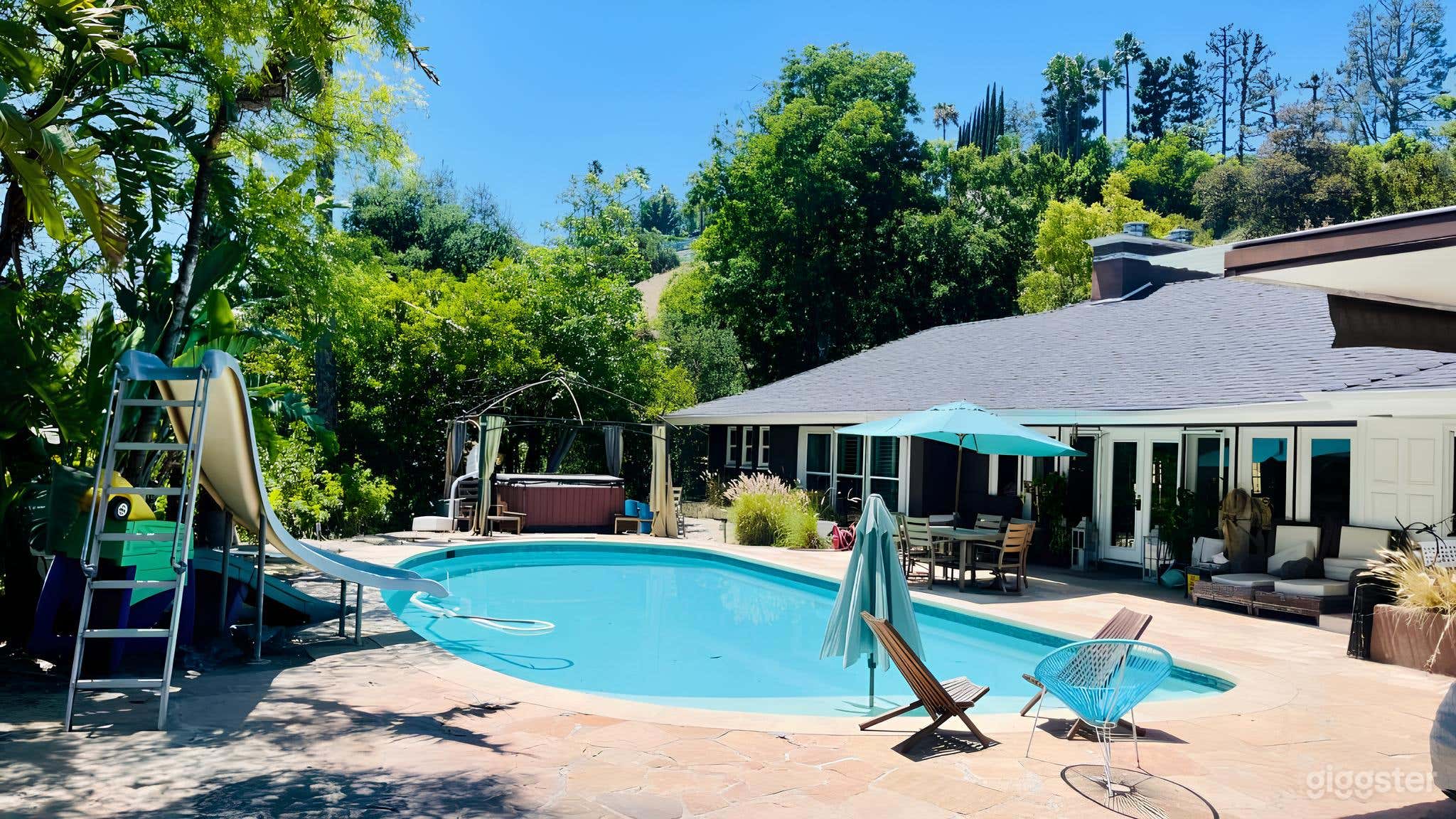 In-Ground Pool with Lounge Chairs and Shaded Areas Photo 1