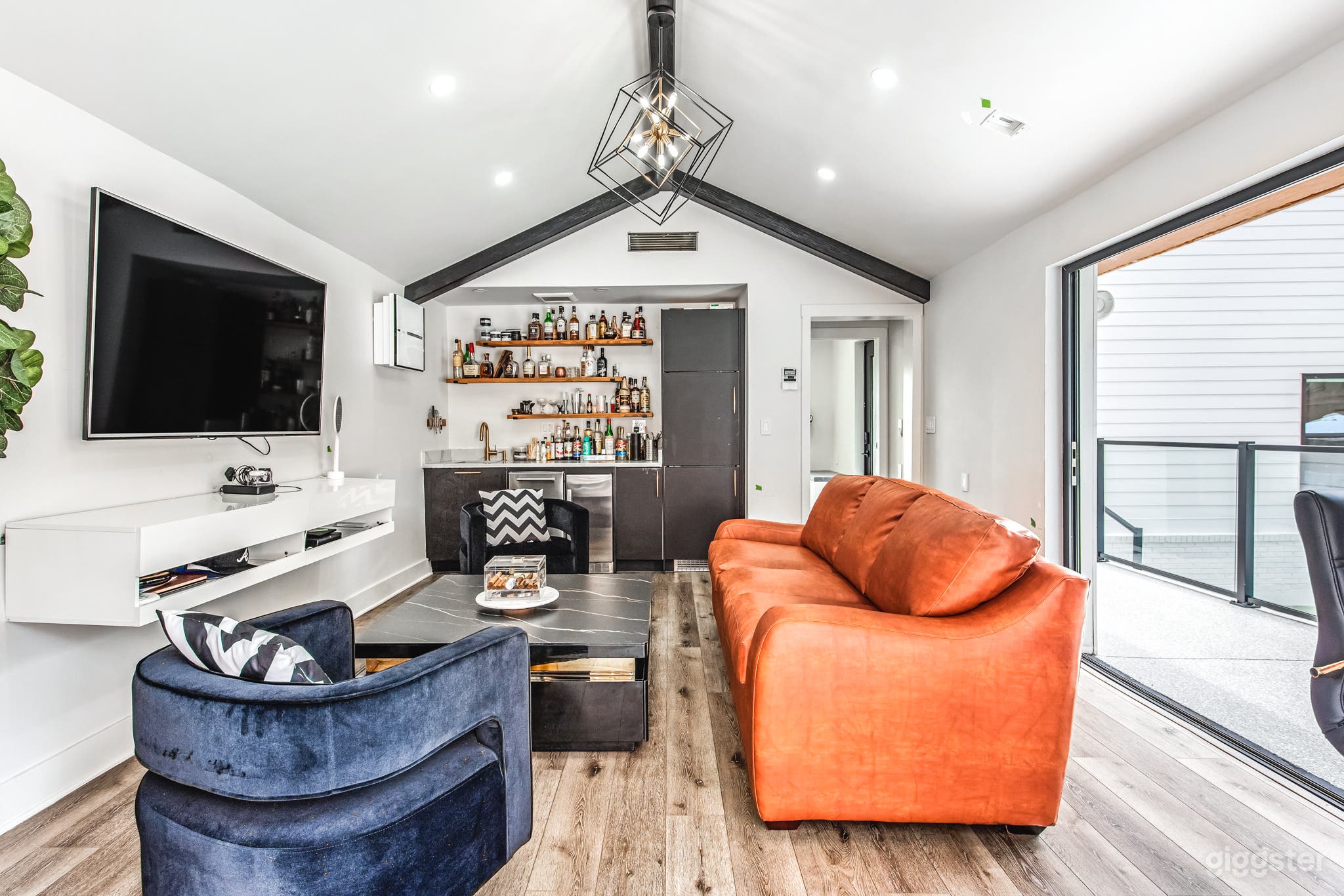 Modern White Brick Home with Outdoor Pool Oasis Photo 4