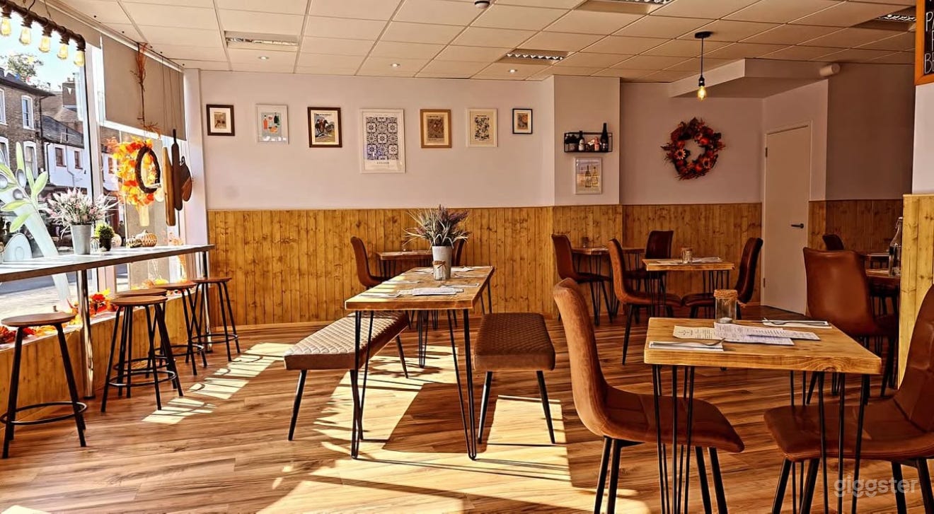 Modern Coffee Shop With Warm Vibe Photo 1