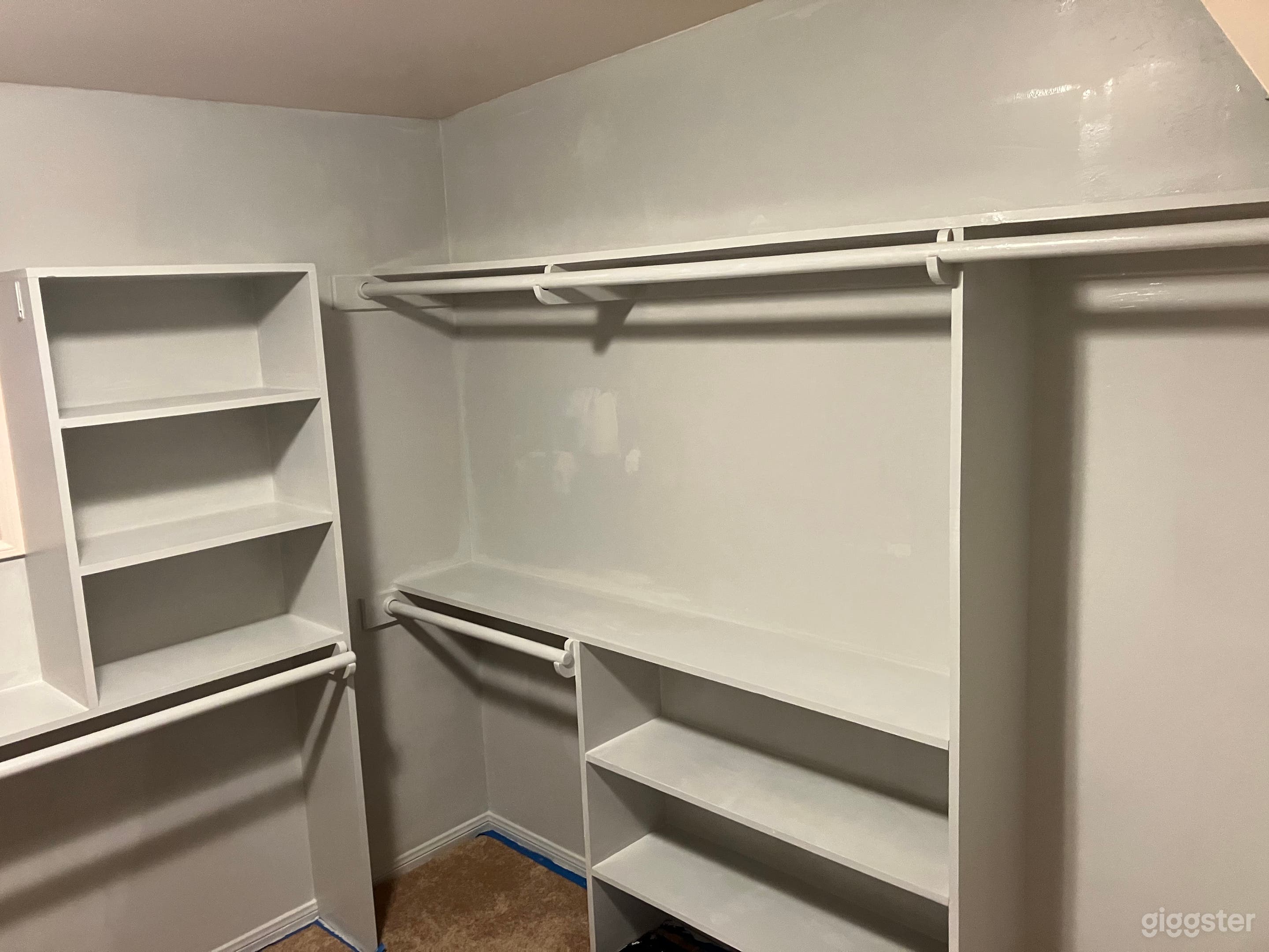 Walk-in close with clothes remove to show color and style