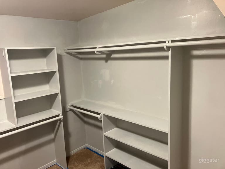  Walk-in close with clothes remove to show color and style 