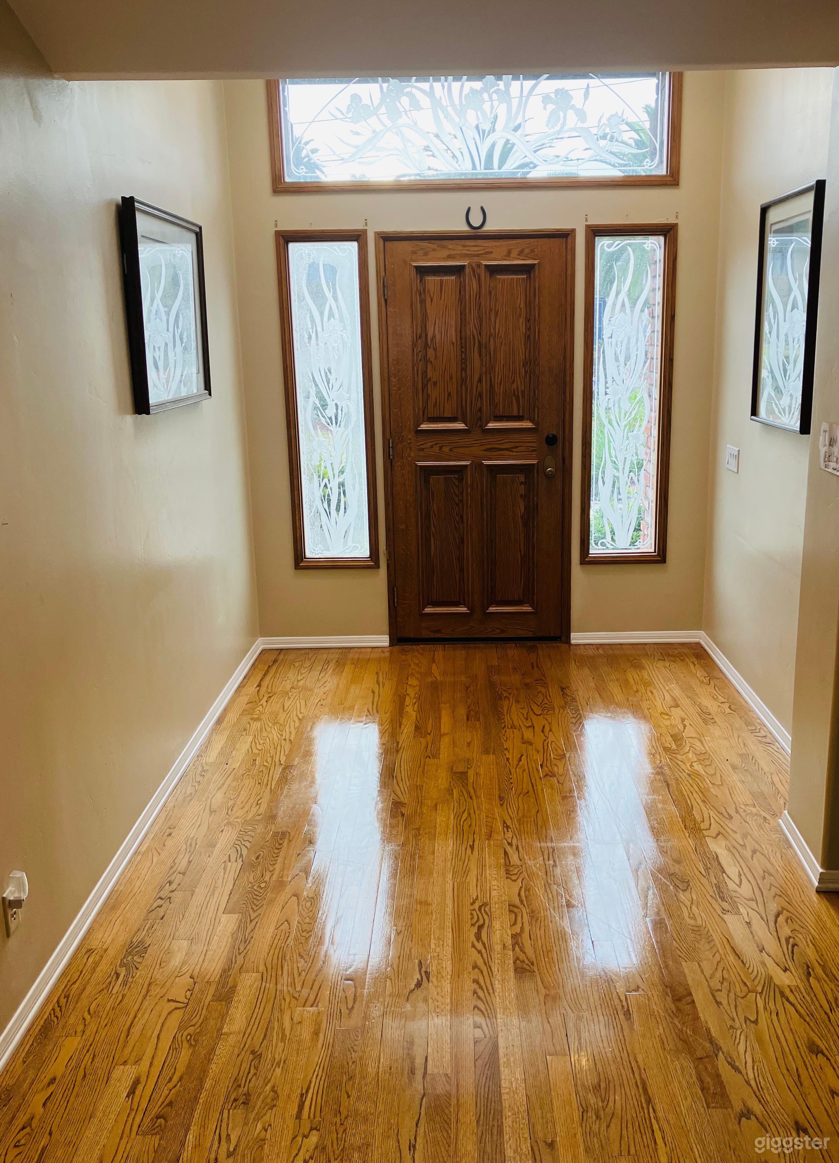 Front door entry with area rug removed and furniture to show what it looks like