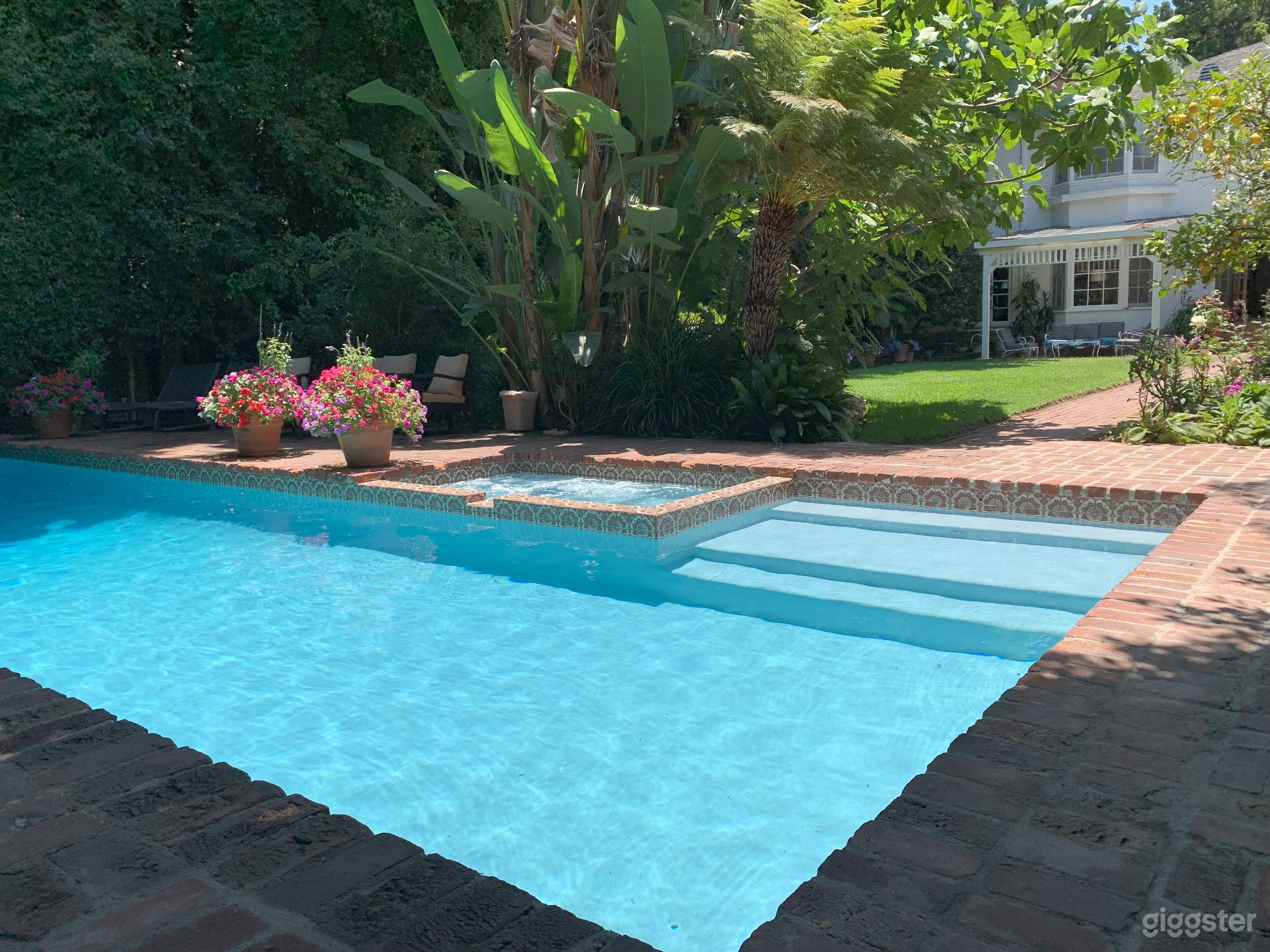 Large pool and hot tub in lush private backyard Photo 4