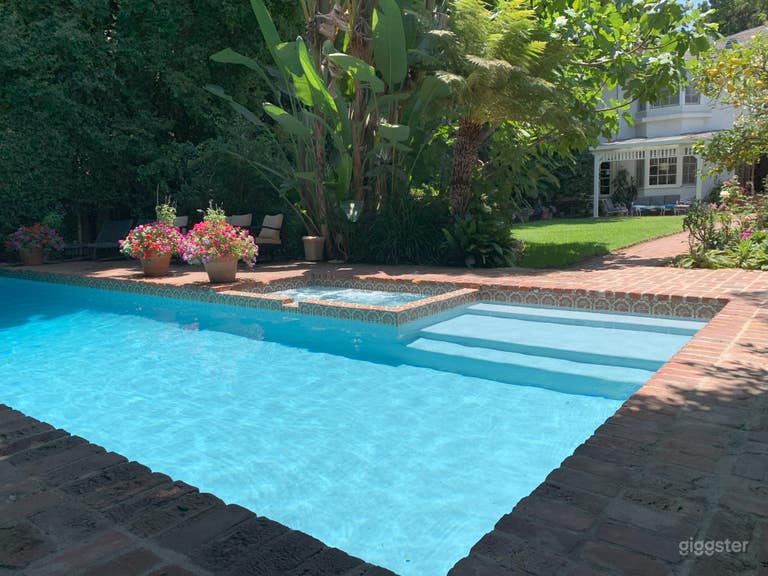  Large pool and hot tub in lush private backyard 