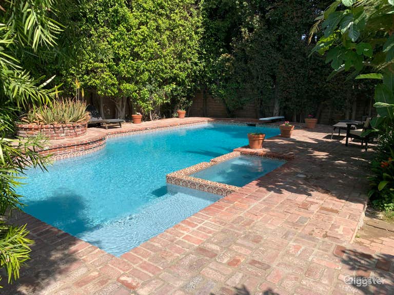  Large pool and hot tub in lush private backyard 