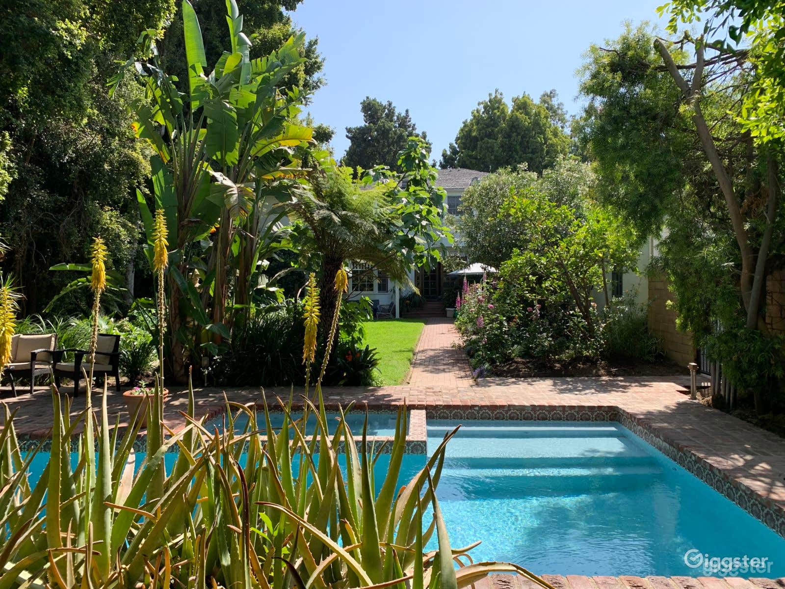 Large pool and hot tub in lush private backyard Photo 1