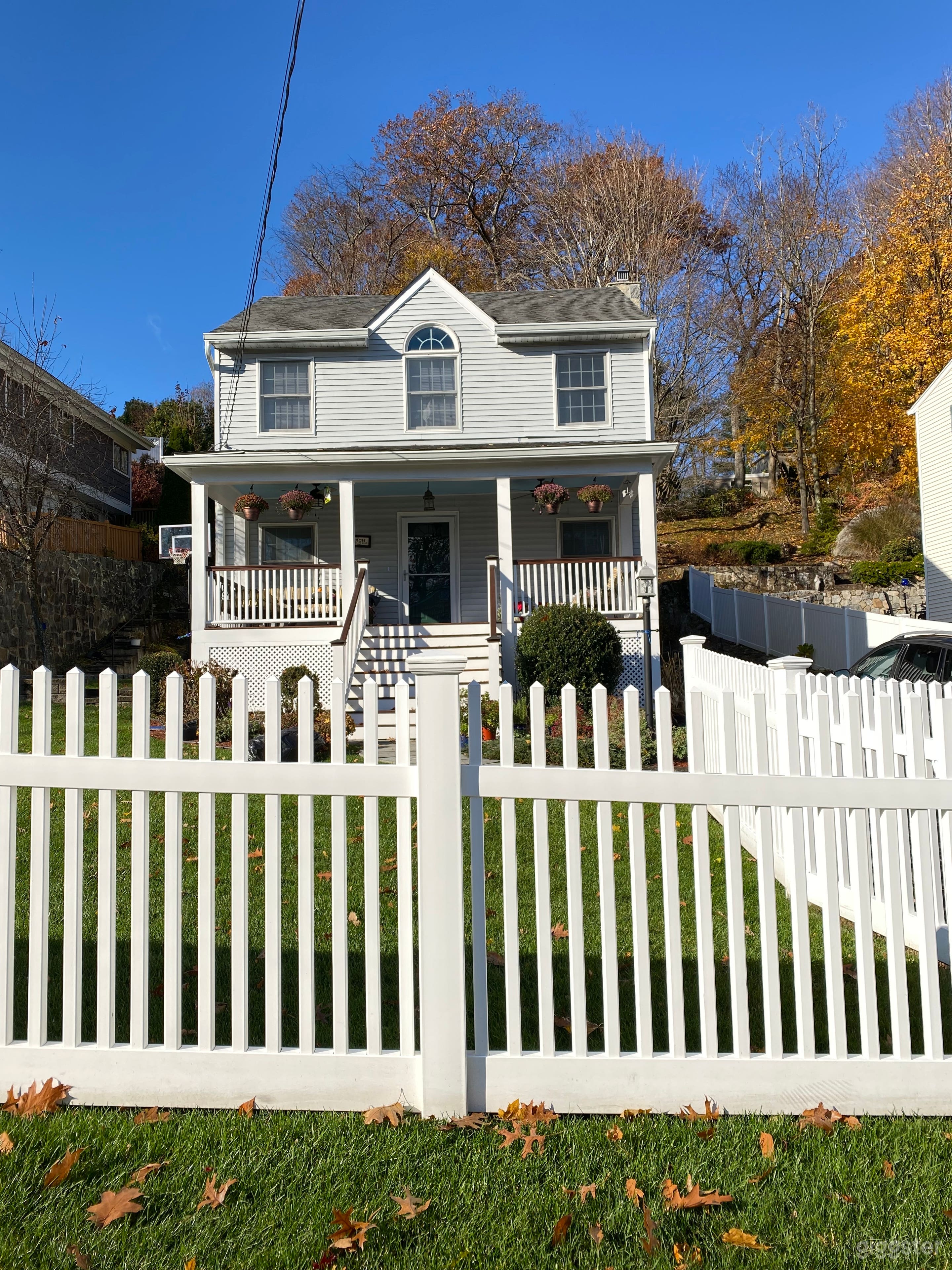 Anyplace USA 
Porch has a blue ceiling , 2 crawling fans and dark wood floor 
Instagram page for views - etc @theporch565