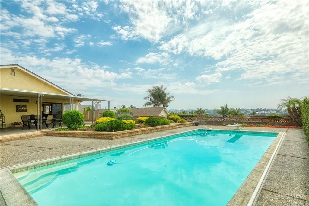 Rectangular Pool with Ocean View and Reflecting Tranquility Photo 2