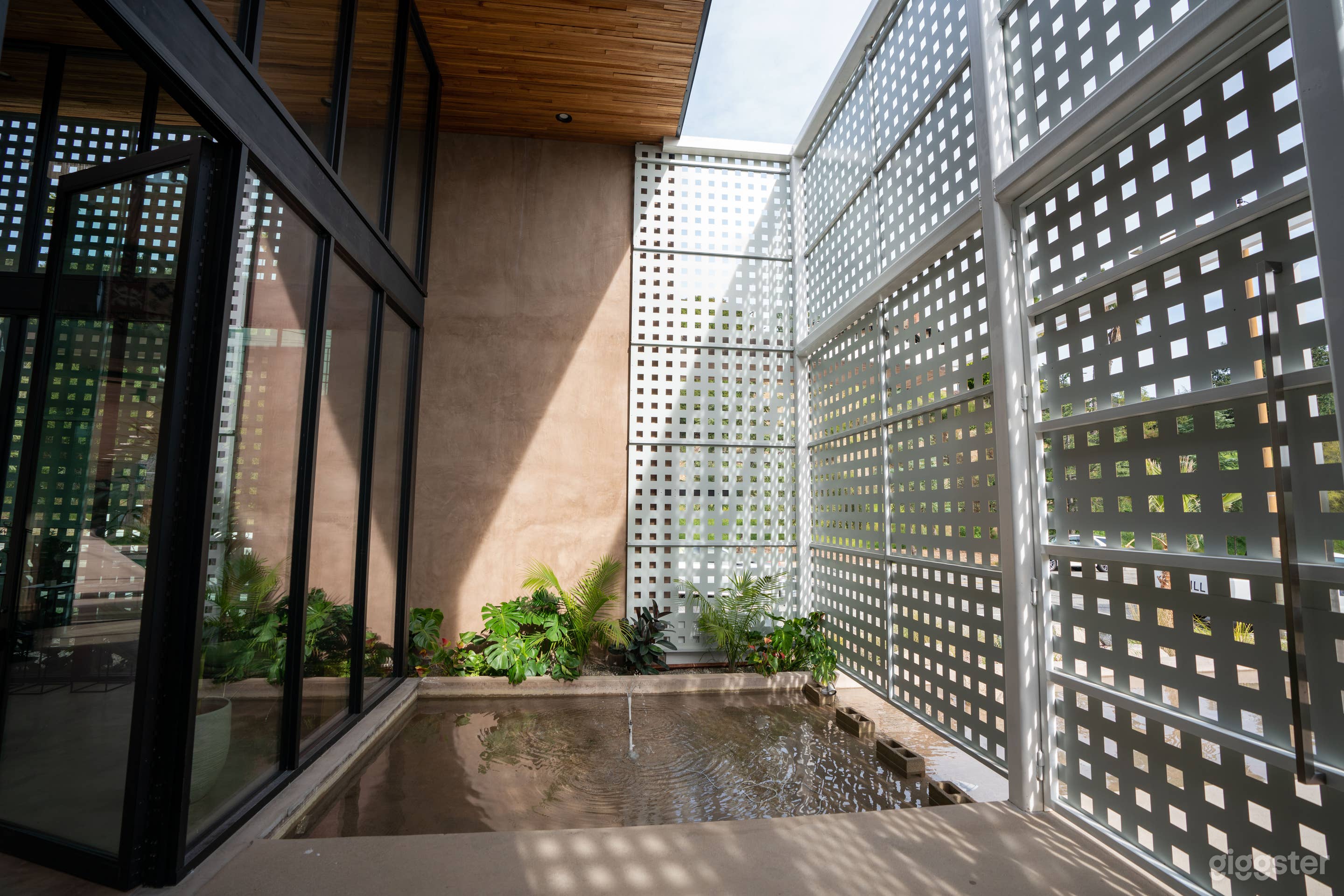 Concrete Oasis: A Villa Retreat with Poolside Serenity Photo 3