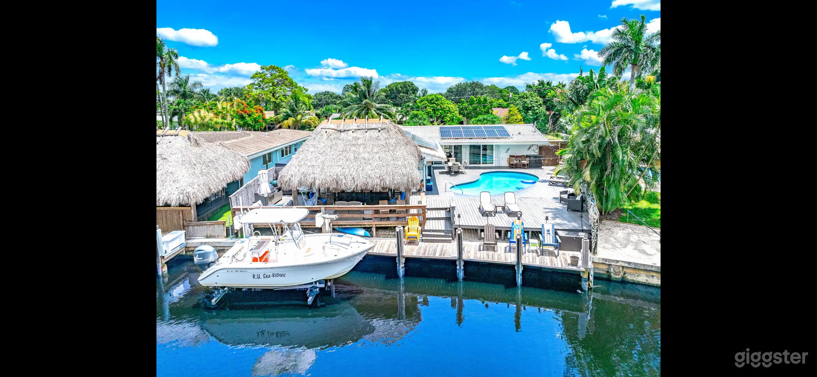 Private tropical tiki bar overlooking the waterfront