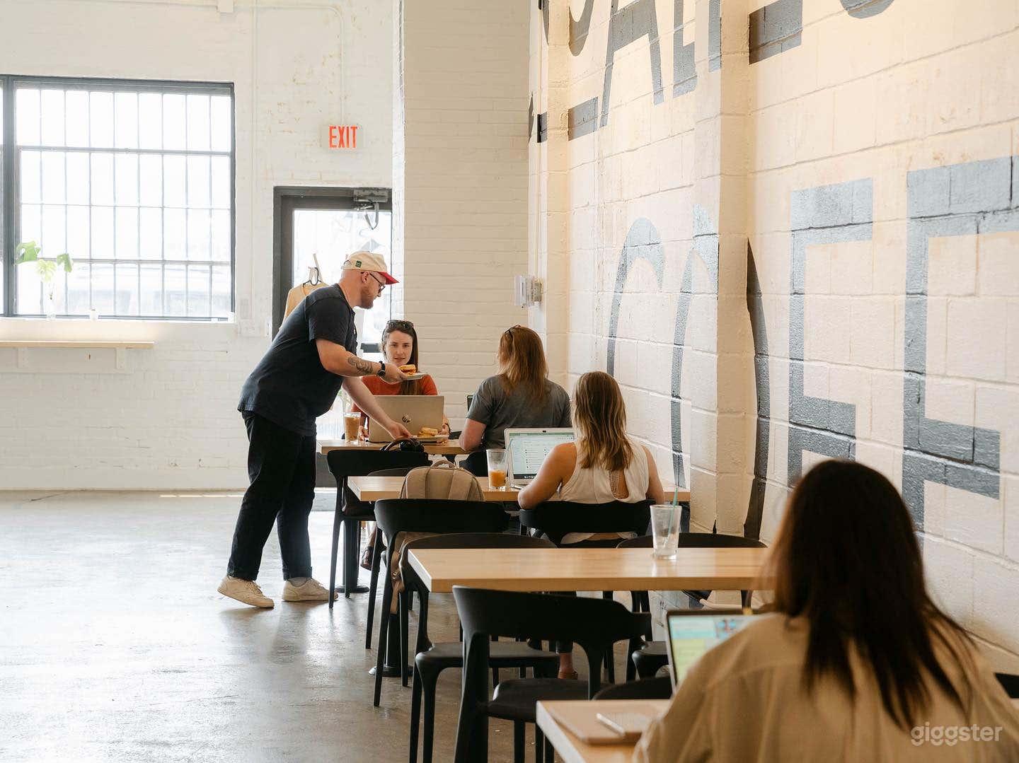 Entrance Door &amp; Bolted Tables in Cafe Space