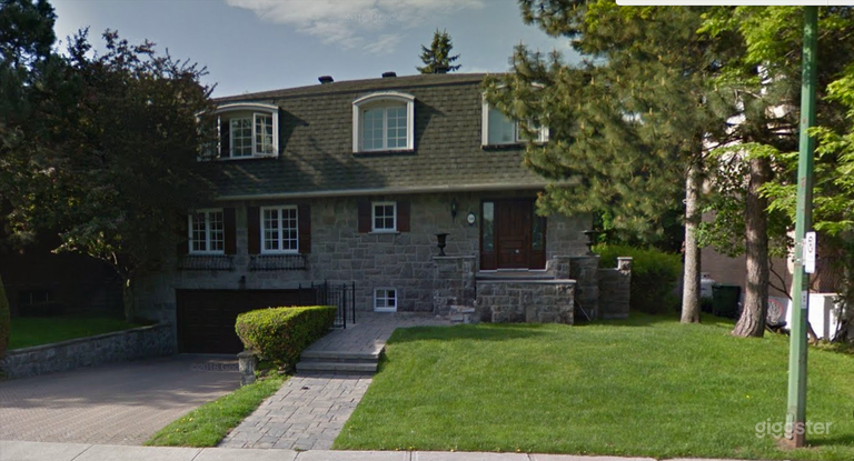  Discretely luxurious grey stone home 