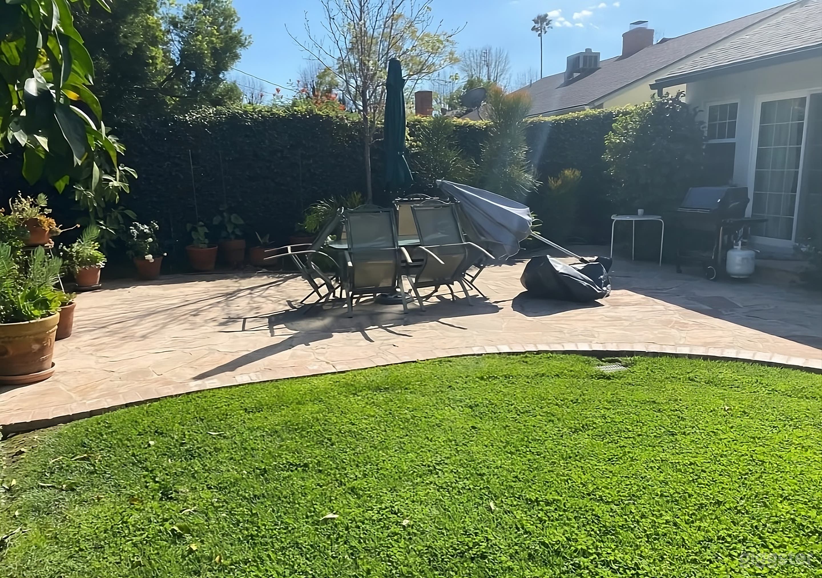 Beautifully Sun Drenched Backyard Photo 1