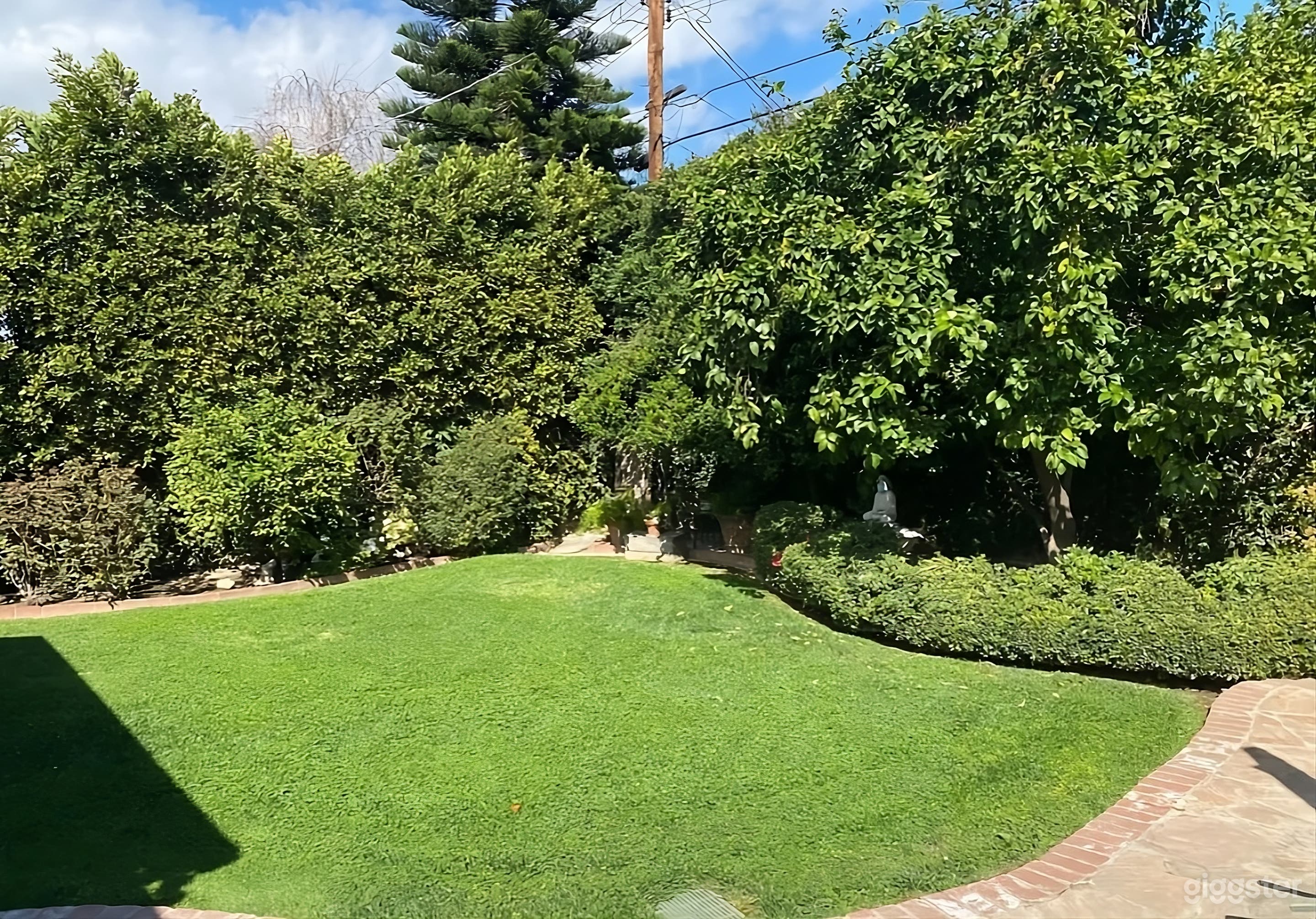 Beautifully Sun Drenched Backyard Photo 4