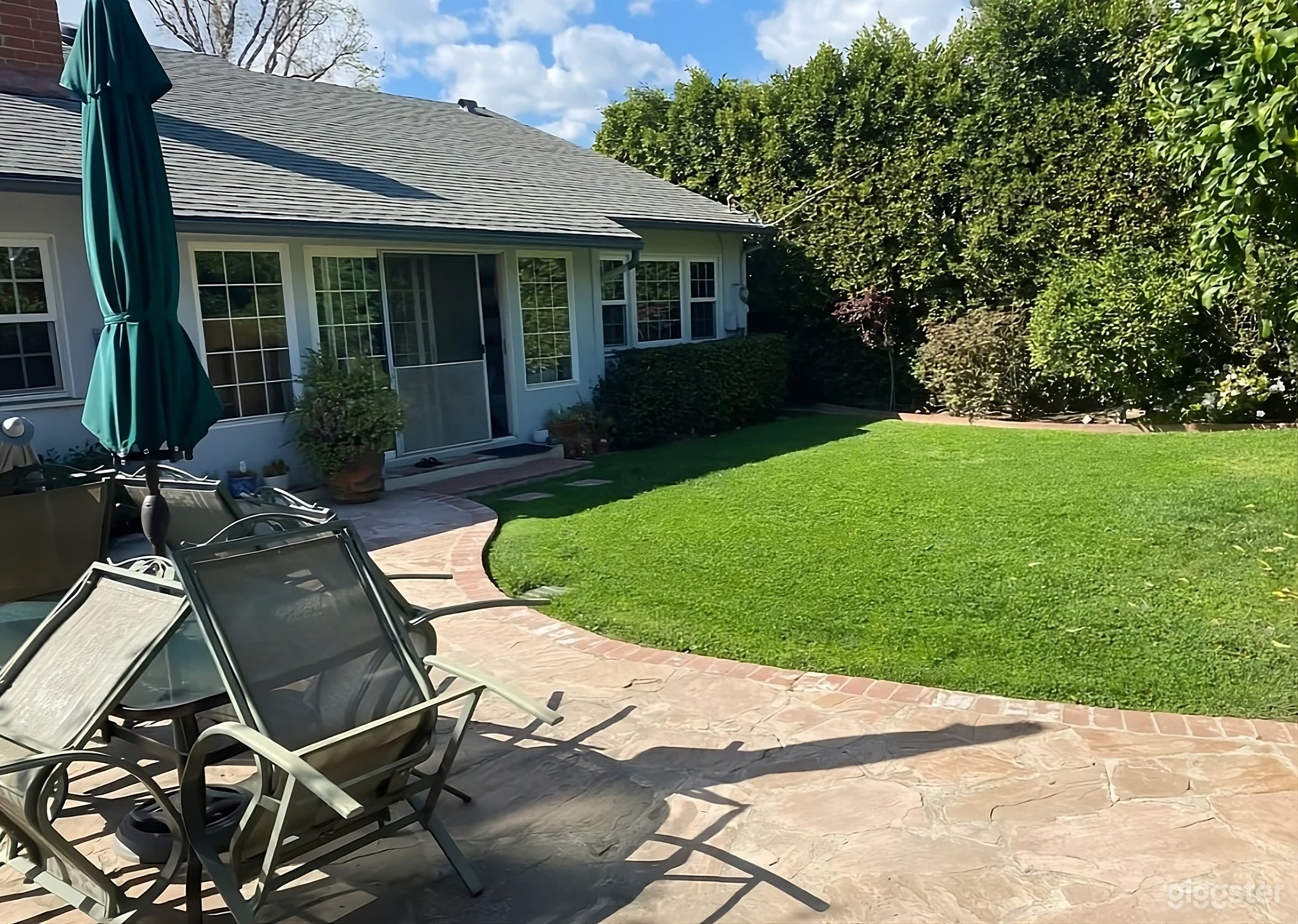 Beautifully Sun Drenched Backyard Photo 3