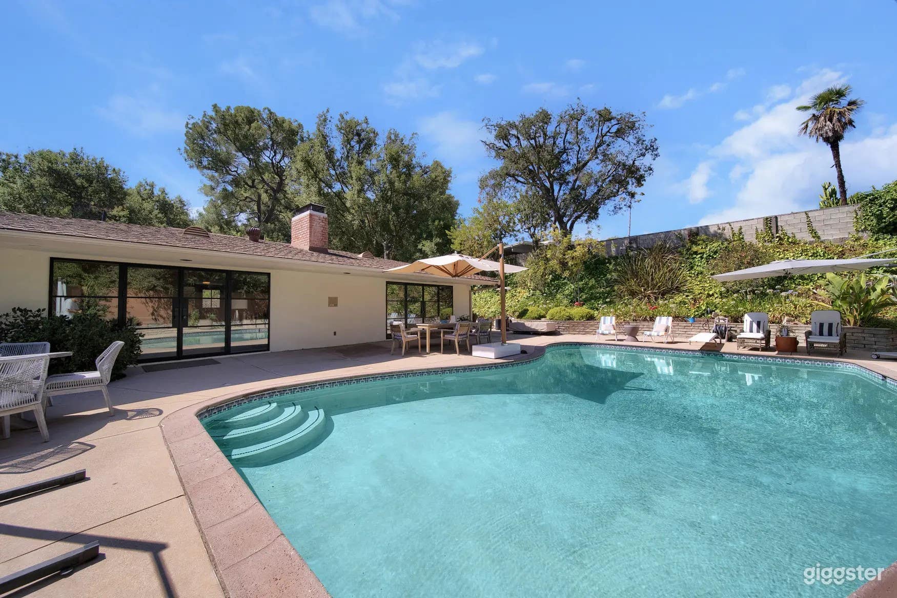 Outdoor Pool in a Mid-Century Modern Home Photo 1