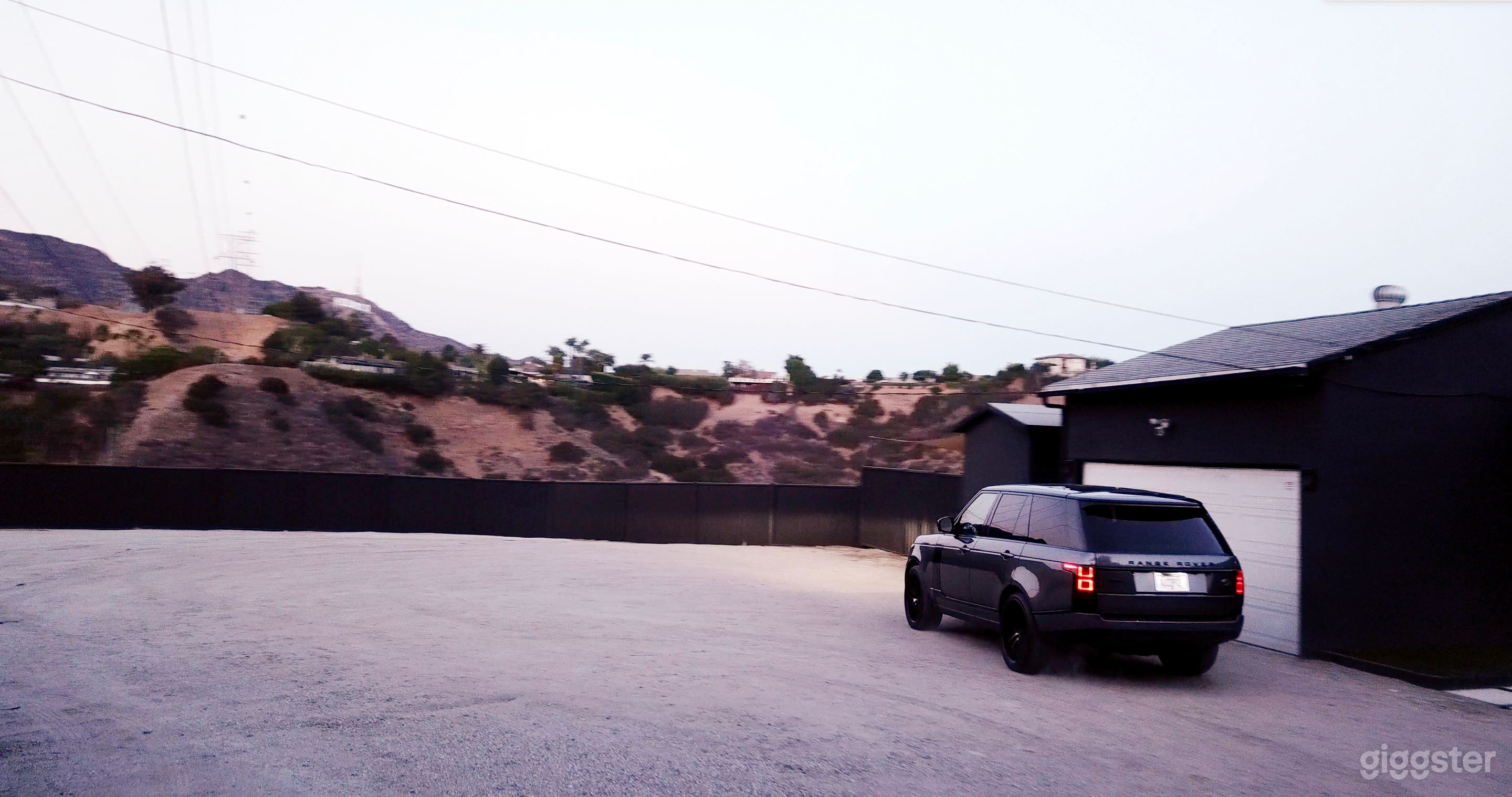 Big Flat &amp; Fence Privet Parking Lot in front of the Hollywood Sign that can accommodate few Production tracks