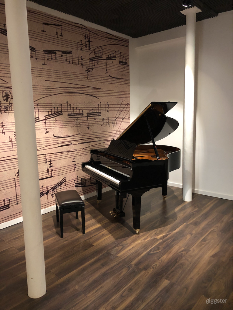  Yamaha Grand piano tuned and maintained regularly.  