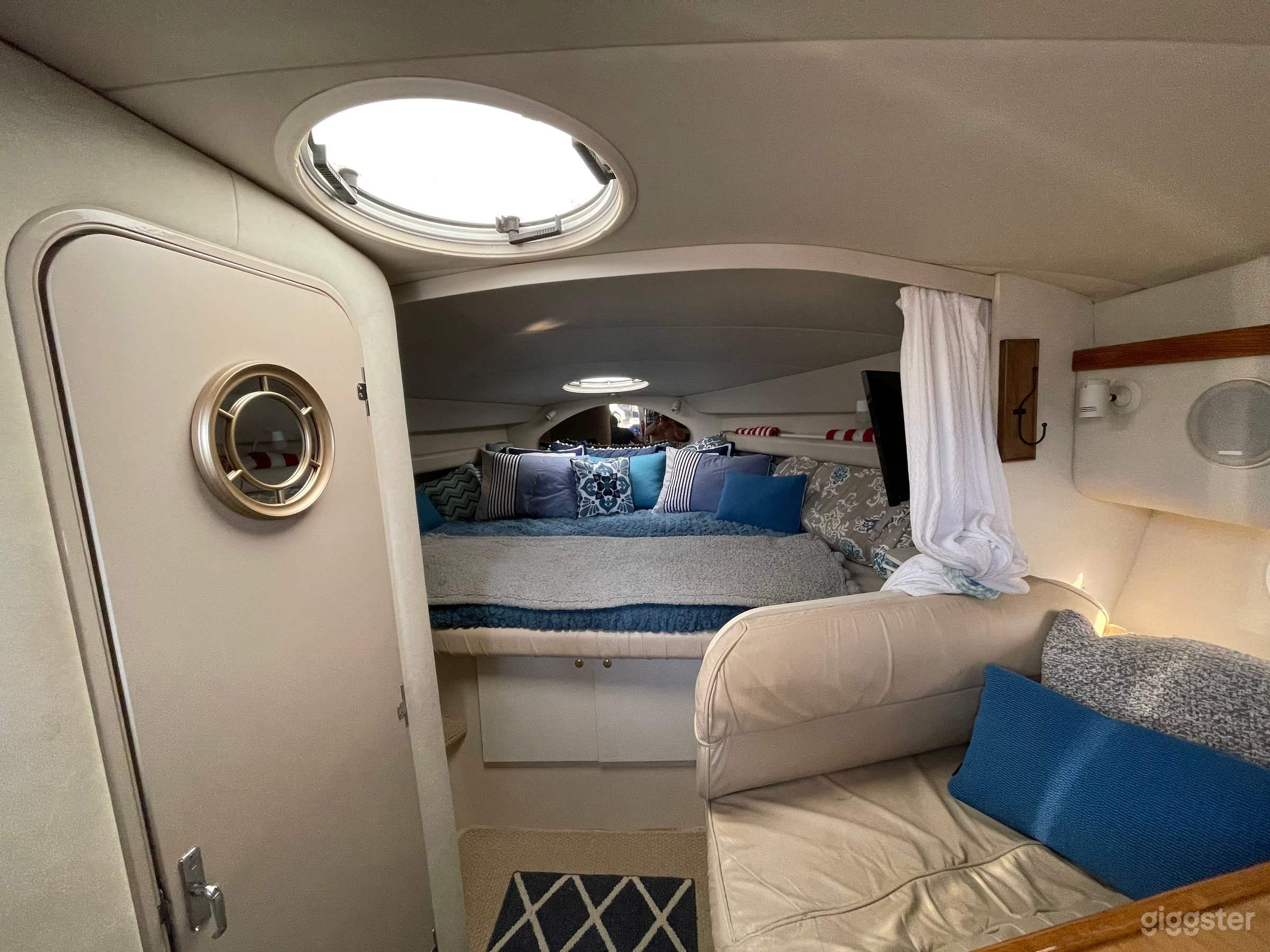 Restroom and large queen bed in V Berth