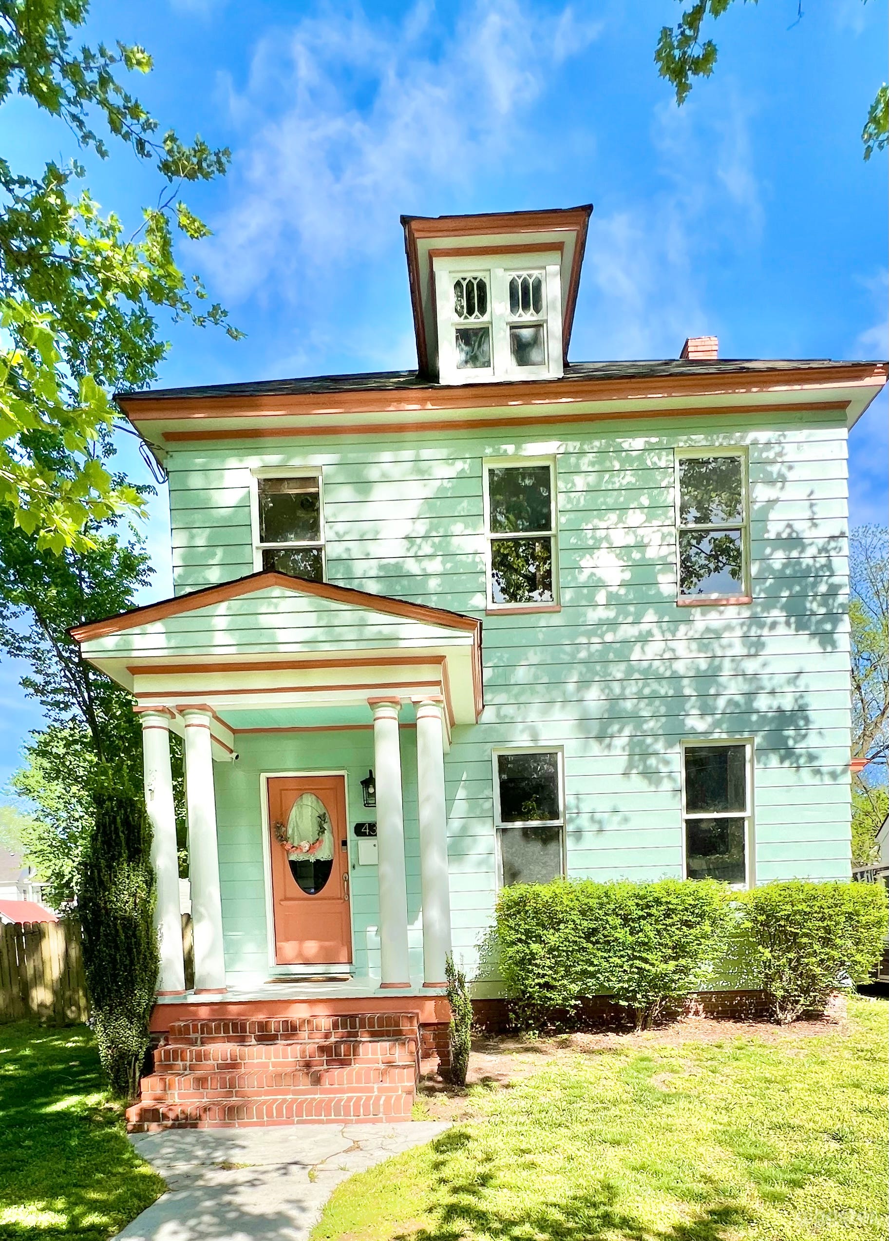 This is a four square house  with  10 foot ceilings and lots of natural light
