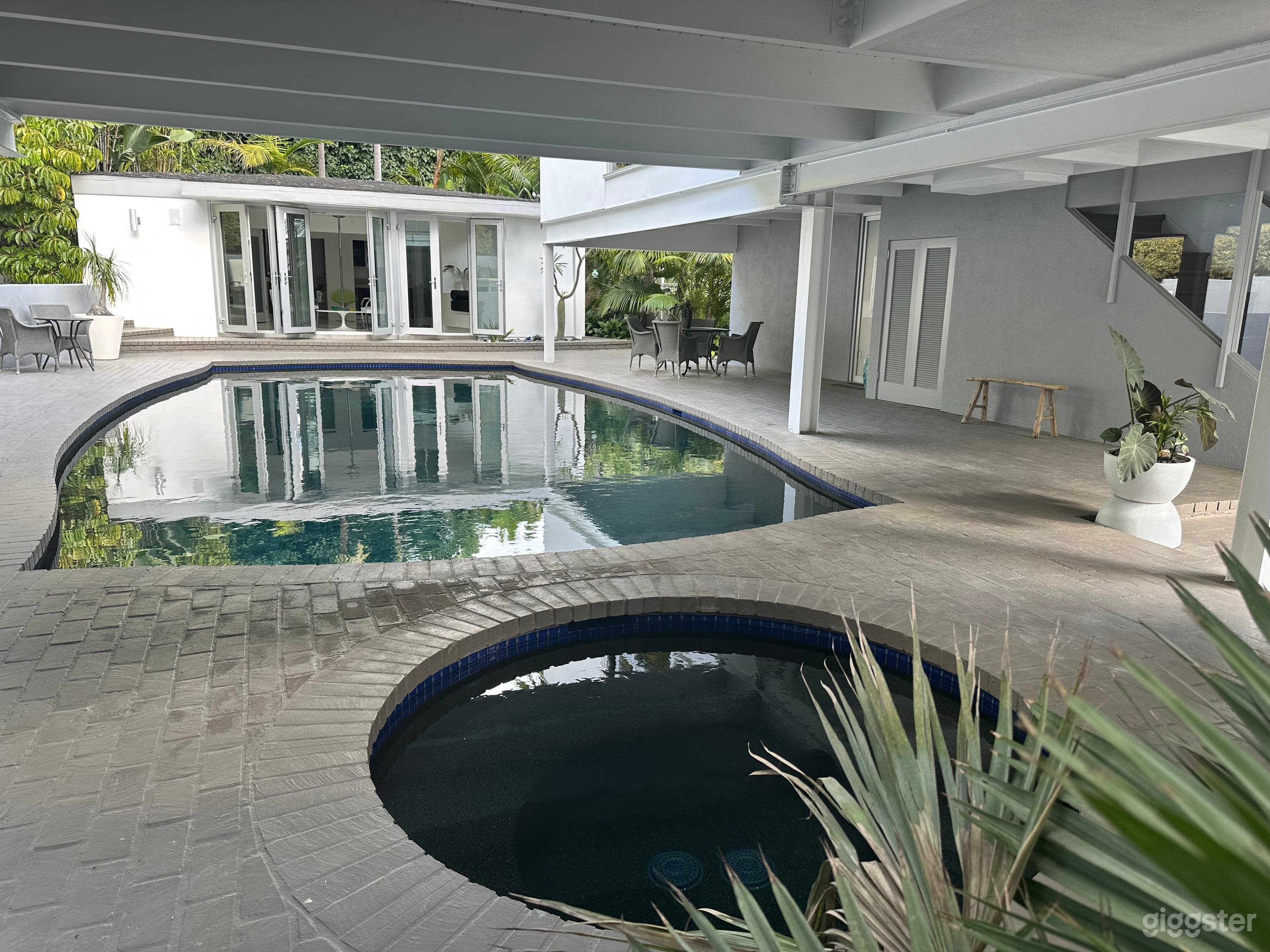 Gorgeous pool and spa with cabana in background.  