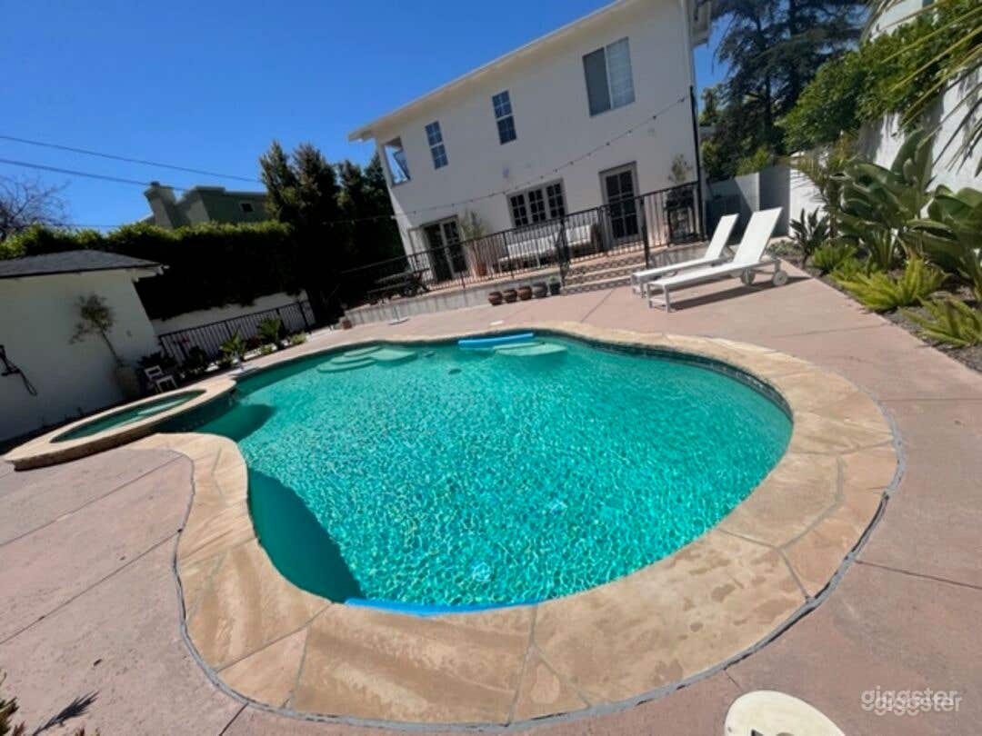 Outdoor Pool in a craftsman home Photo 2