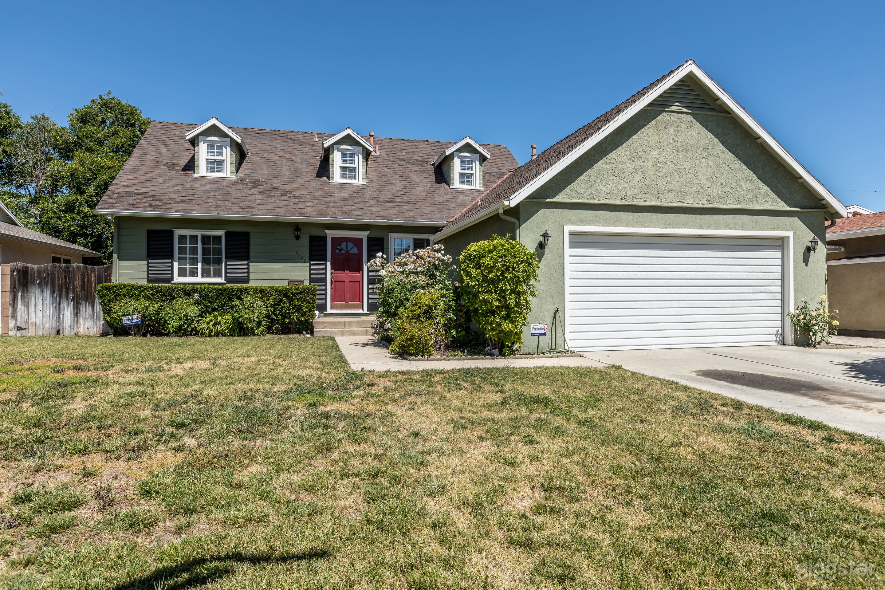 Cozy Wood-Paneled Cape Cod Style Home Photo 2