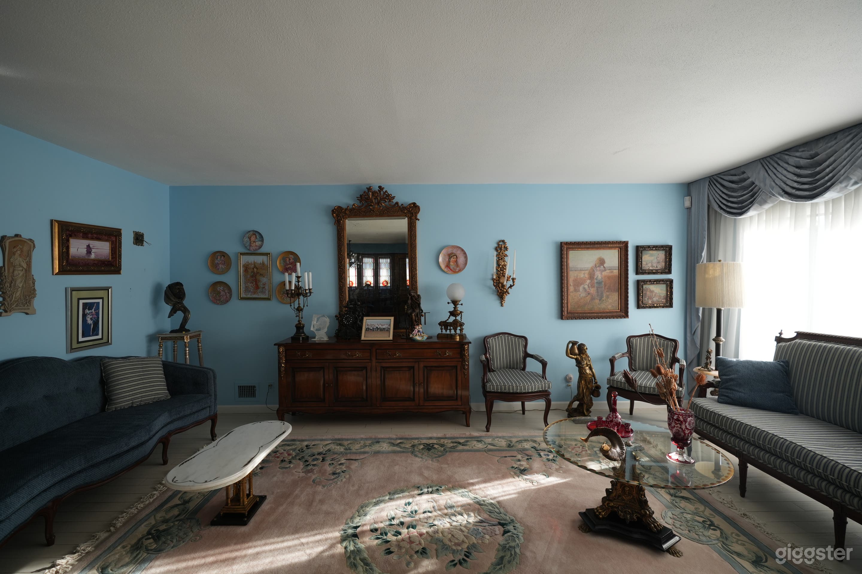 Vintage Blue-Walled Home with Antique Decor, Natural Light Photo 1