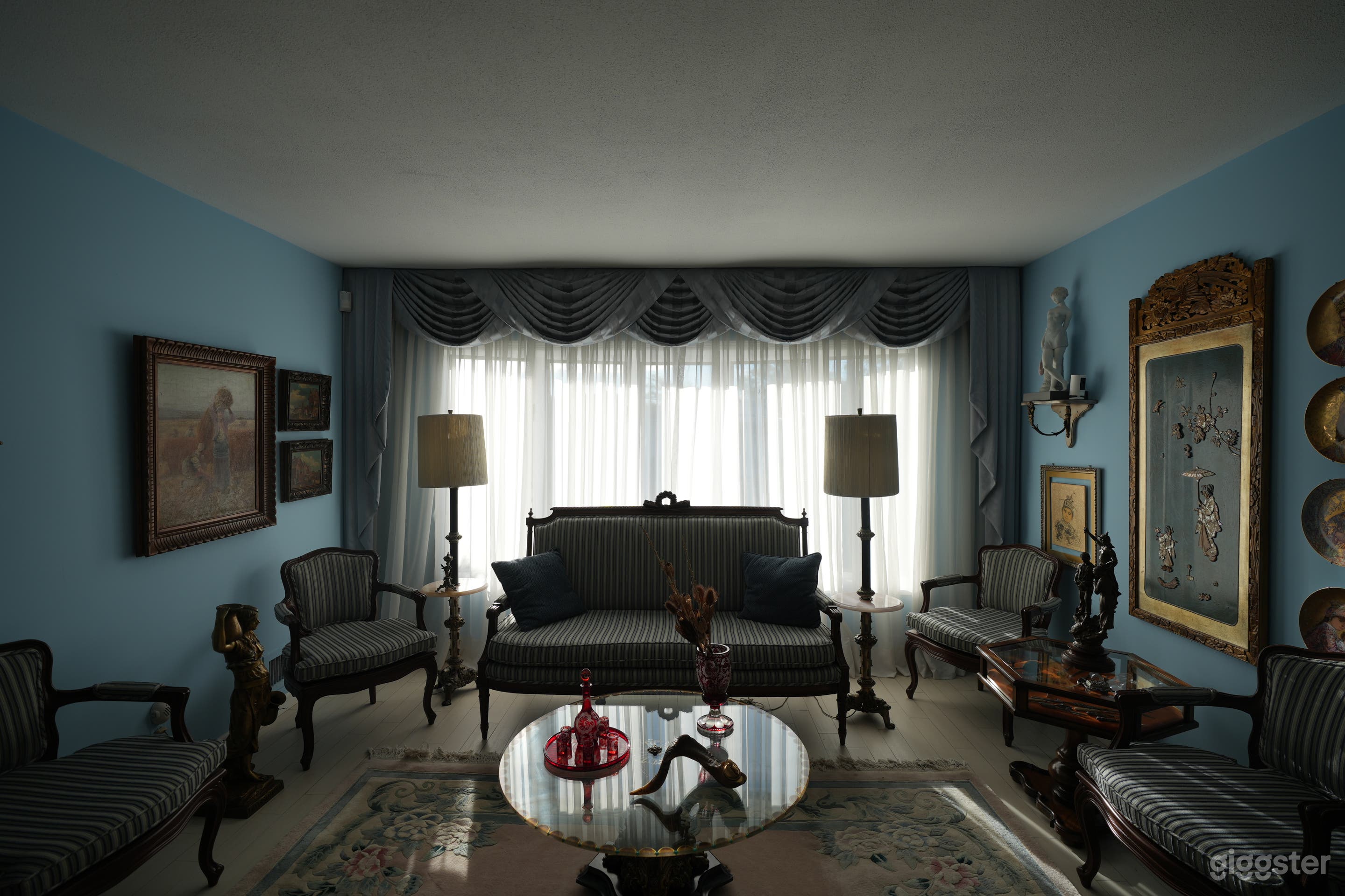 Vintage Blue-Walled Home with Antique Decor, Natural Light Photo 2