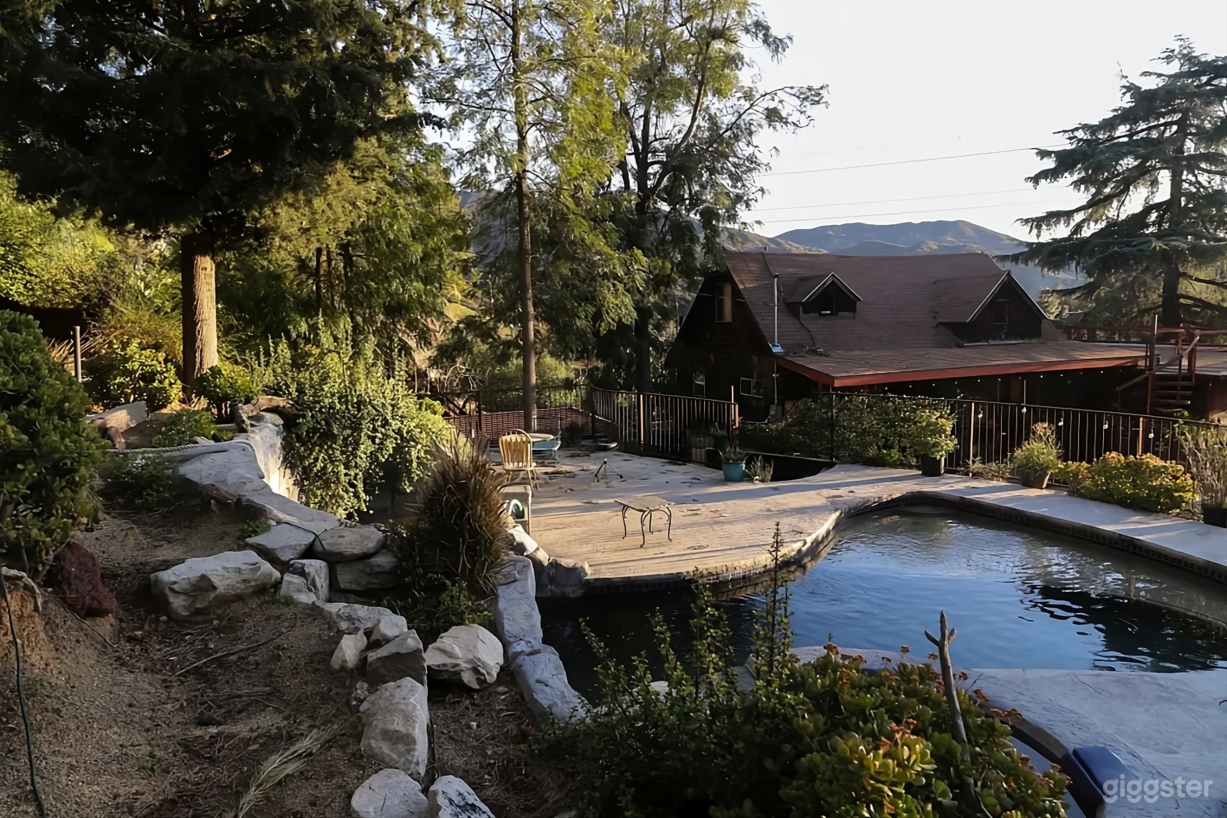 Rustic Hillside Backyard Retreat Photo 2