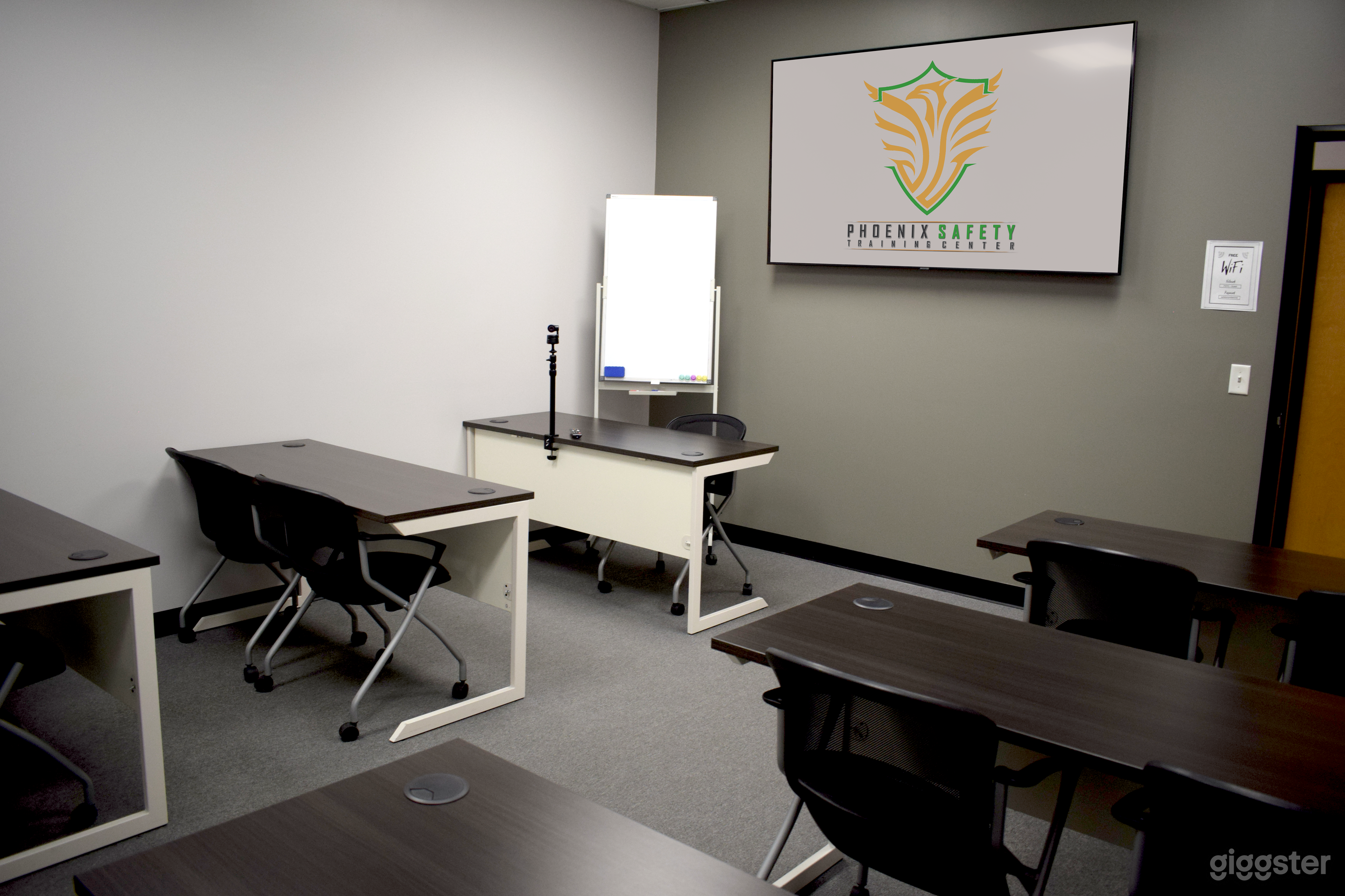 Our 12 person capacity classroom has a large TV for presentations and a mobile whiteboard. Connect to the TVs with your laptop!
