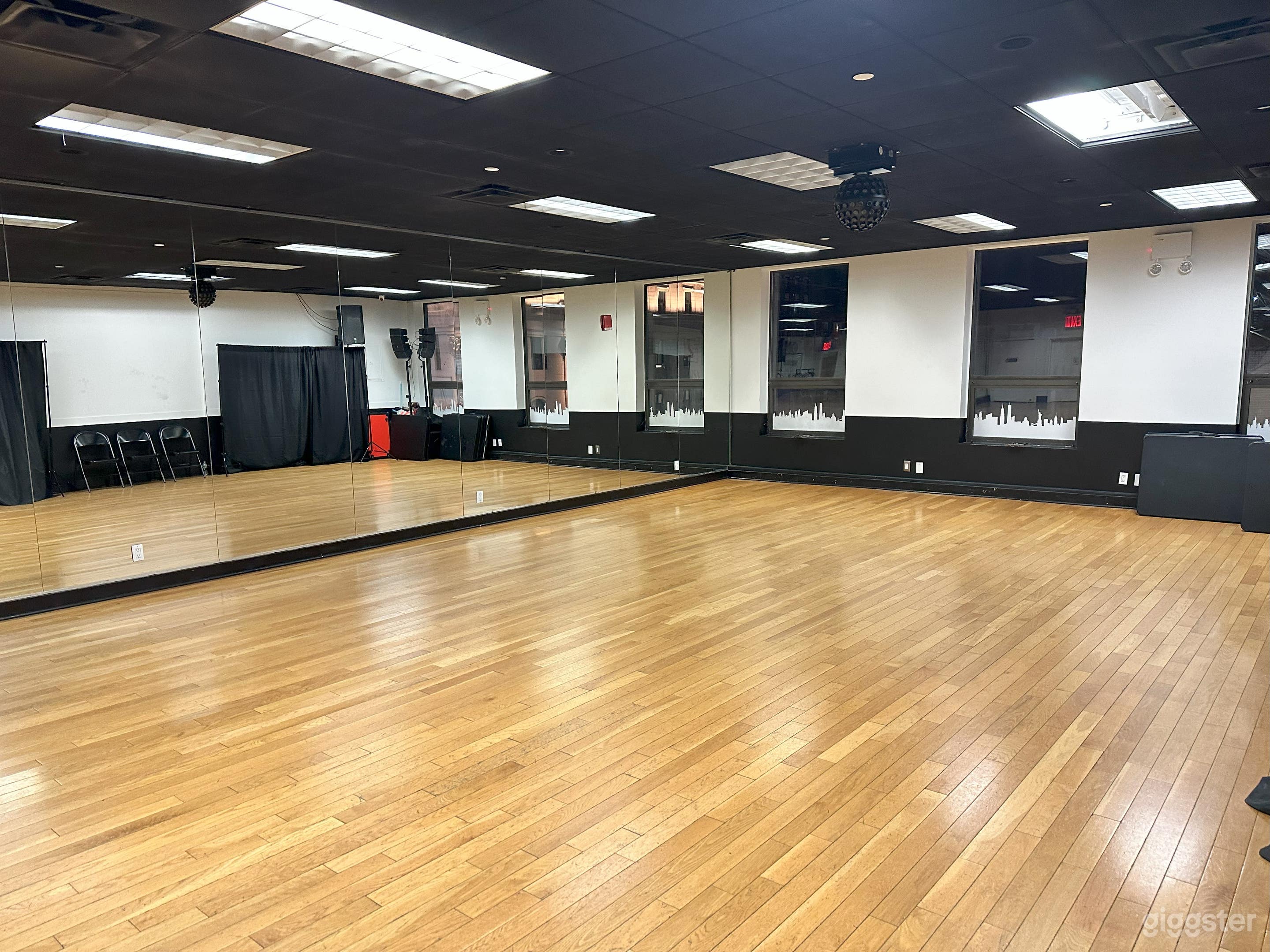 Pristine dance studio with wood floors