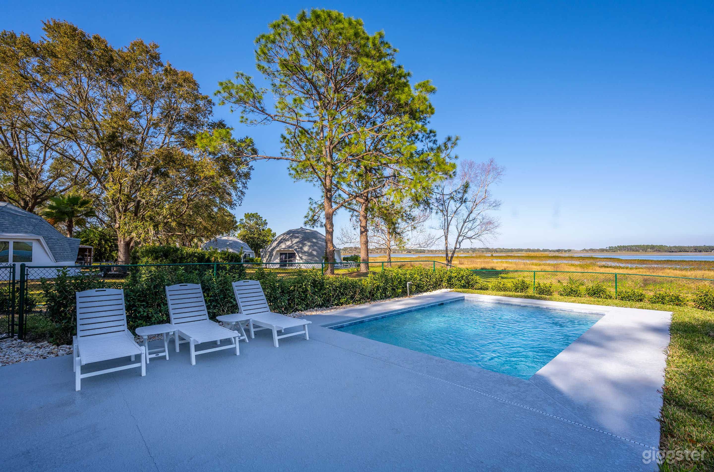 Pool Oasis with Lakeside Views Photo 1