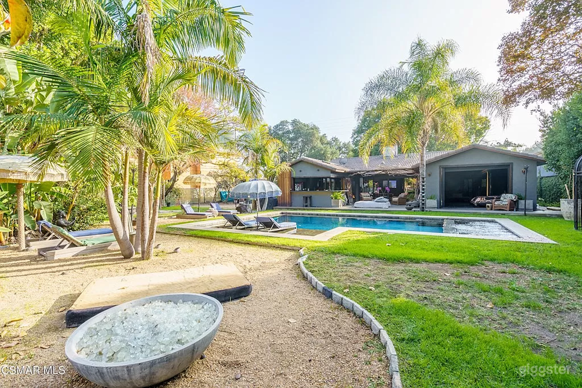 Tropical Oasis on Extravagant Lot  Photo 1