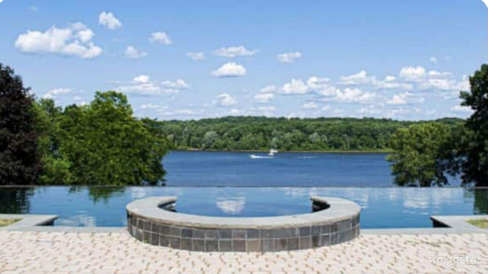 Riverfront Oasis: Infinity Pool, Hiking Trails, Private Beach for Kayaking Photo 2