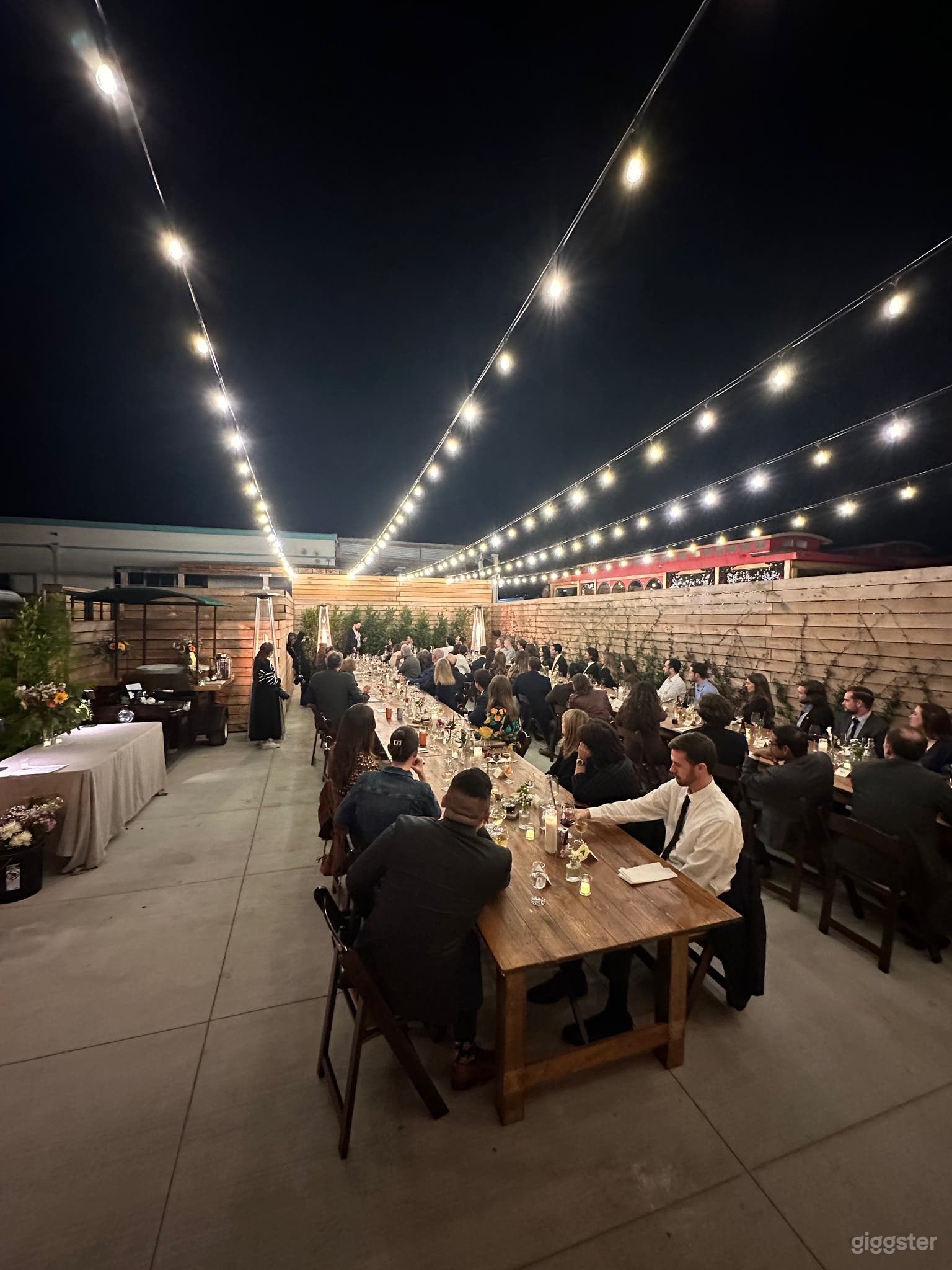 Catered wedding dinner back patio