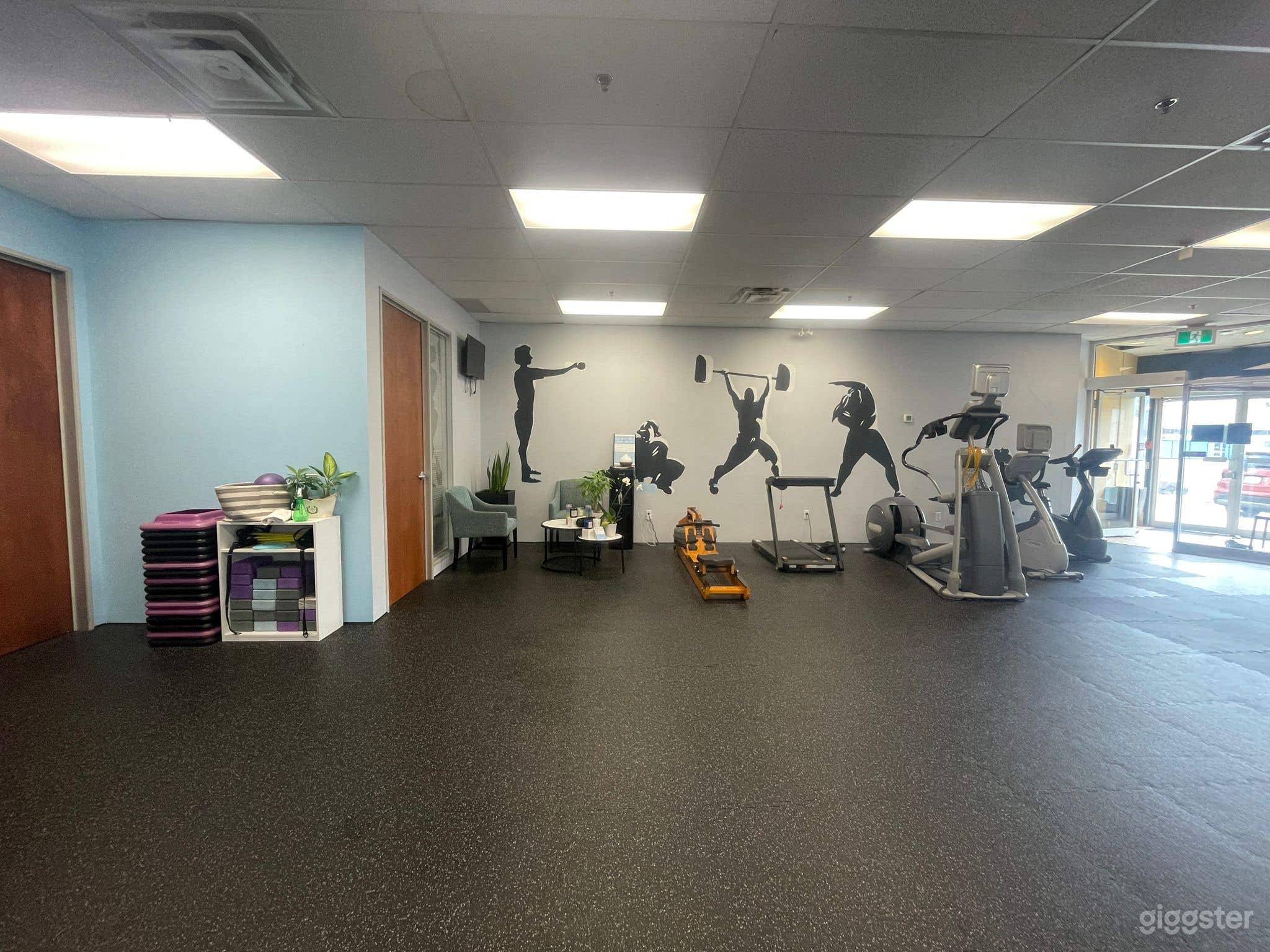 Cute Cozy Uptown Fitness Studio Photo 2