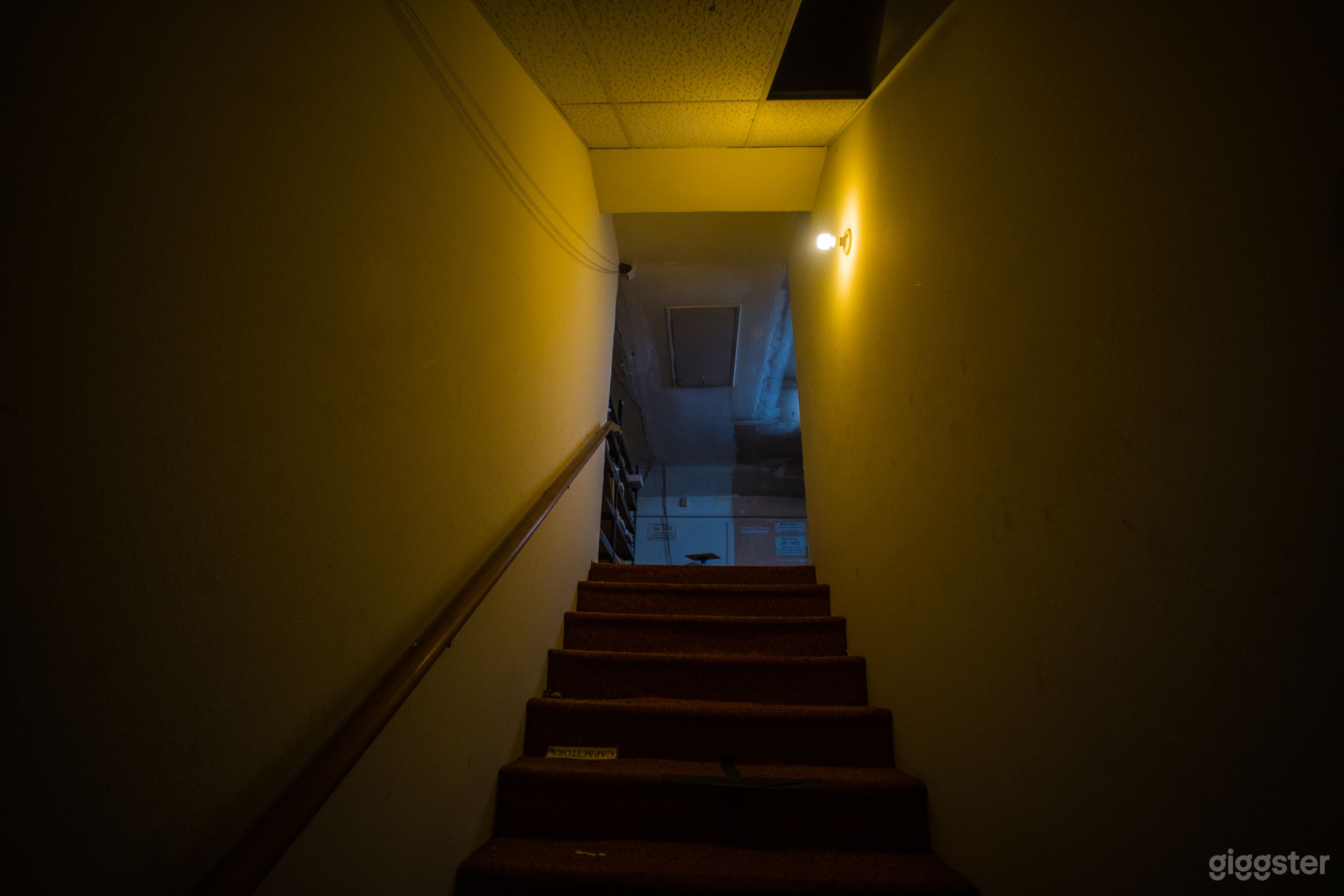 Stairs up to the stockroom