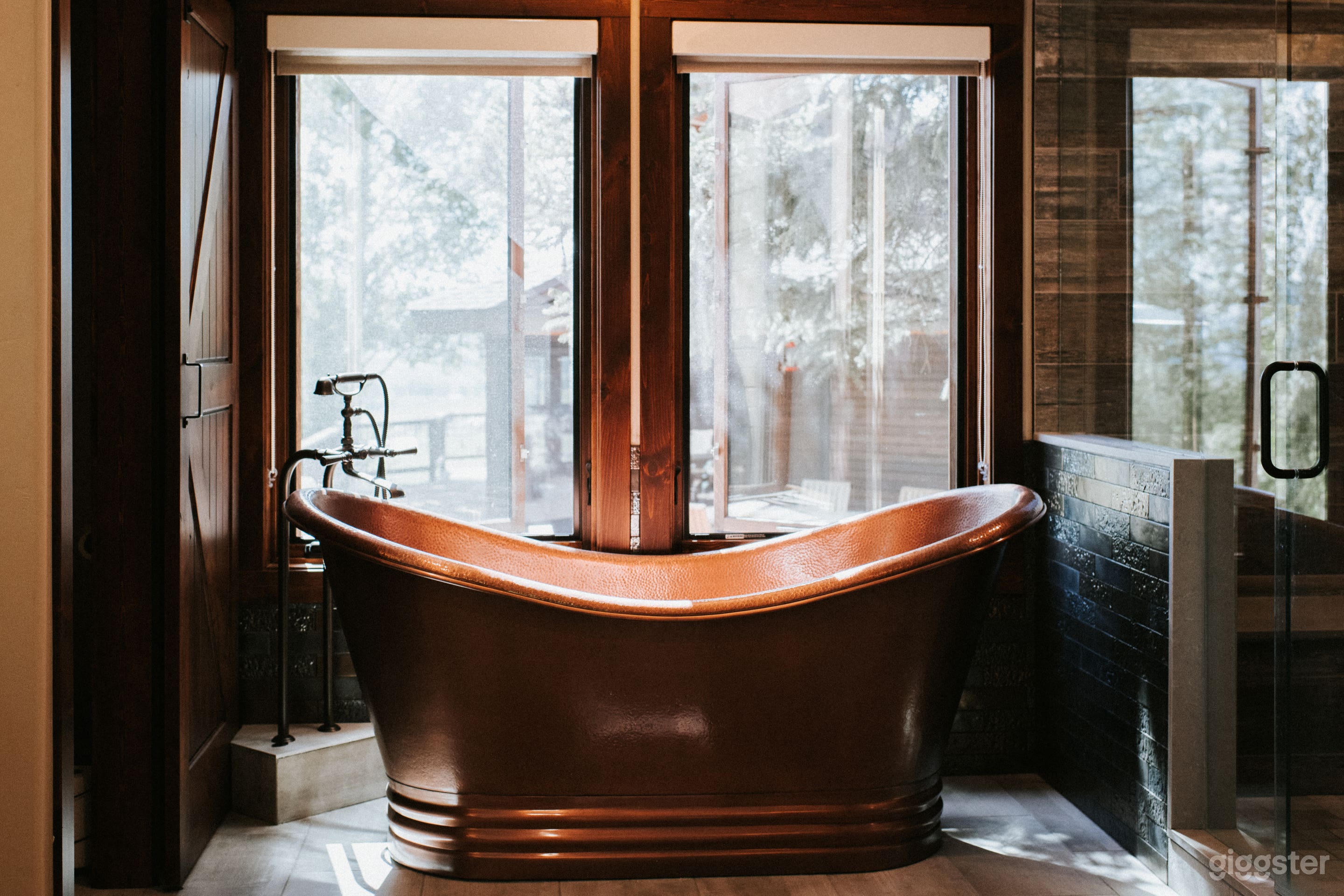 Copper soaking tub in primary suite