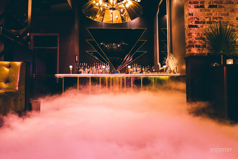  Deco Bar, door on left leads to outdoor patio. Door on right leads downstairs to additional restrooms and a coat check closet. The dancing on clouds experience was activated for this photo, and would be an extra charge for events and photoshoots. 