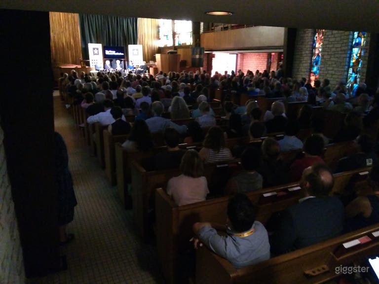  Packed house for a panel discussion. 