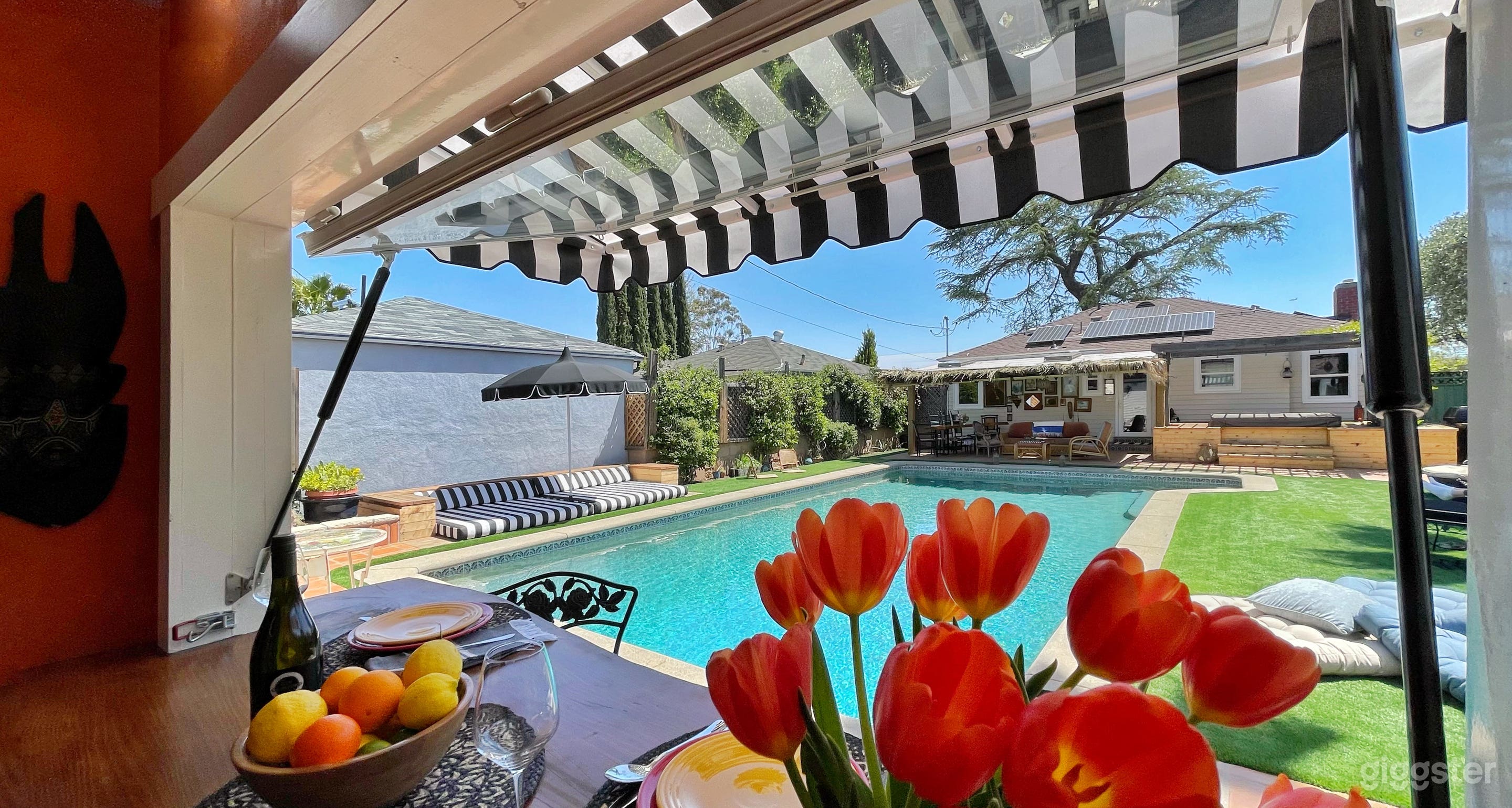 The Bar! The Casita has a large pop-open window that provides a live edge wood bar overlooking the pool
