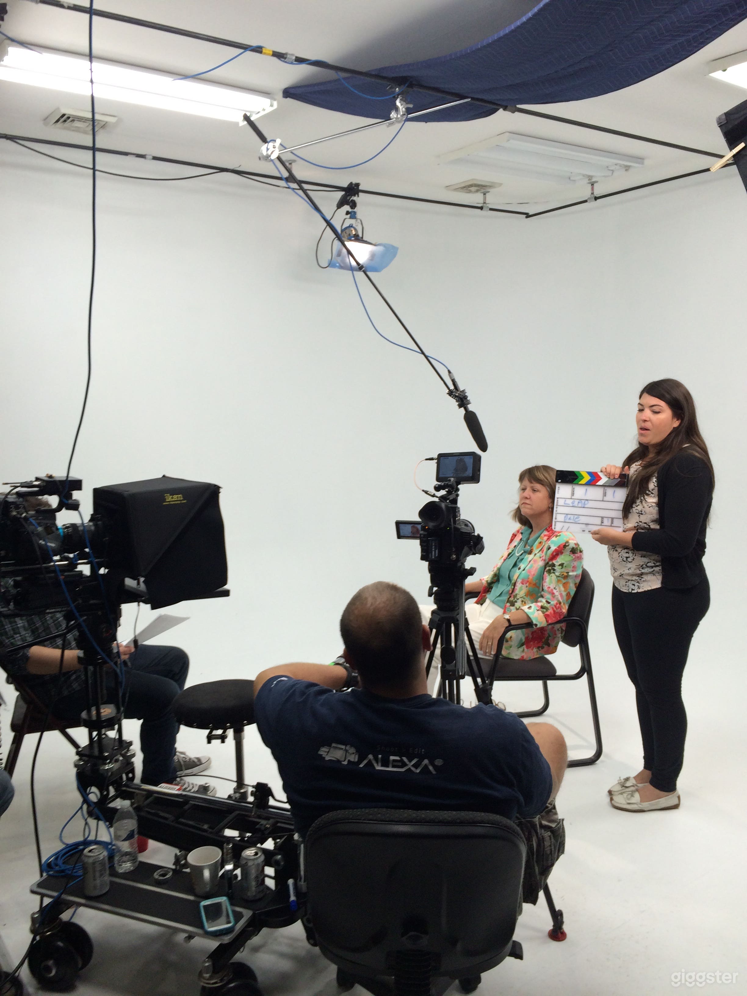 Interview setup on white cyclorama