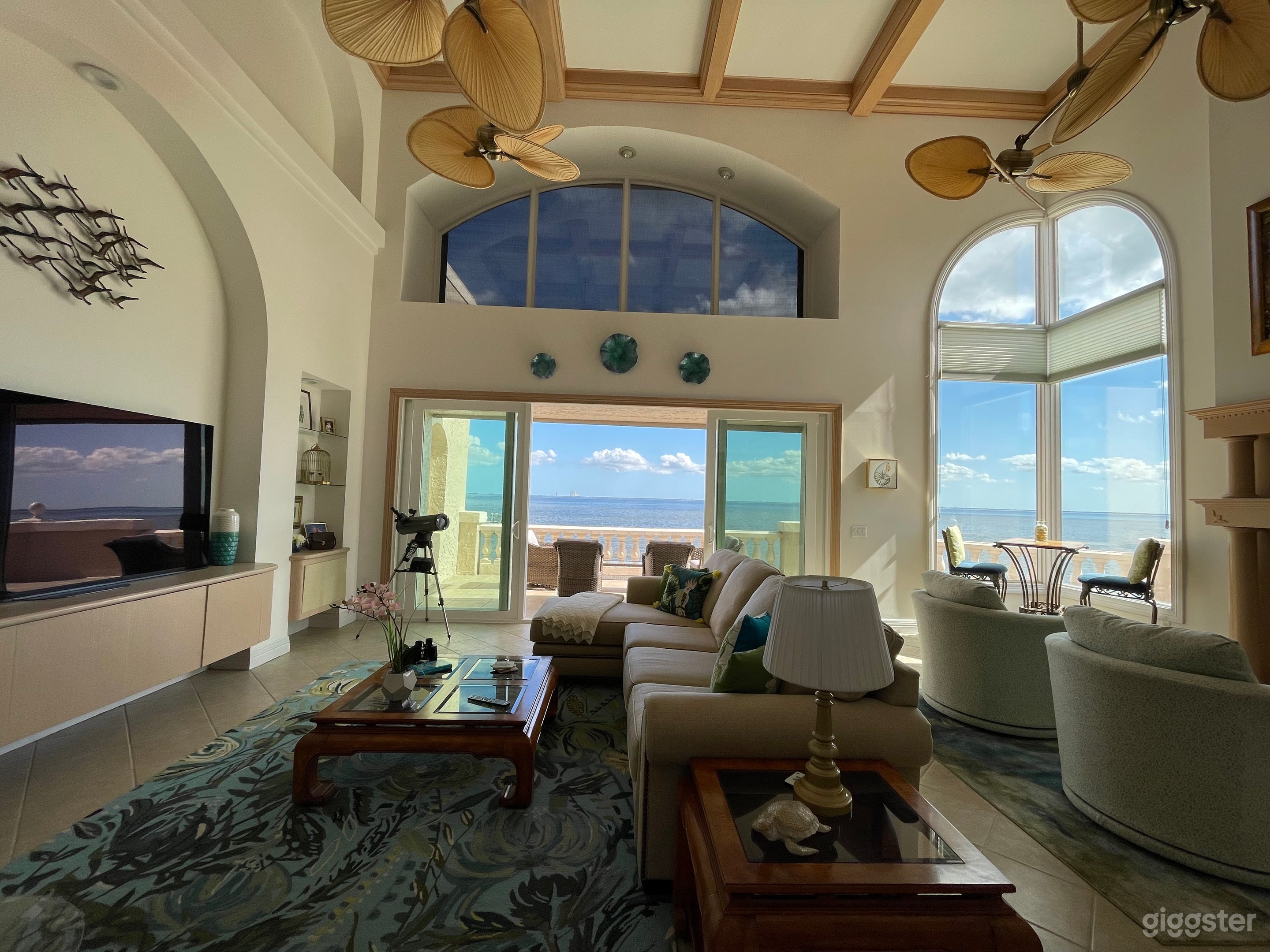 Great Room facing the VAB and the launch pads with a wrap around porch for up close launch views and watching boats go by.