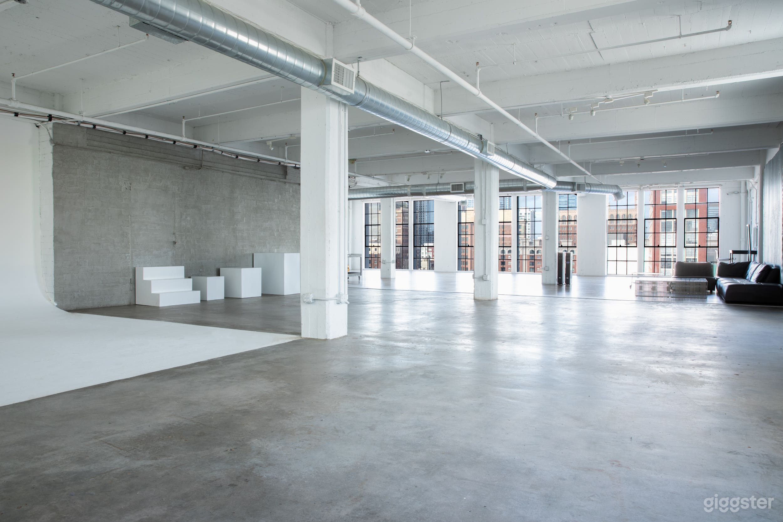 Studio E - DTLA View + White Cyclorama Cove &amp; Wooden floors.
